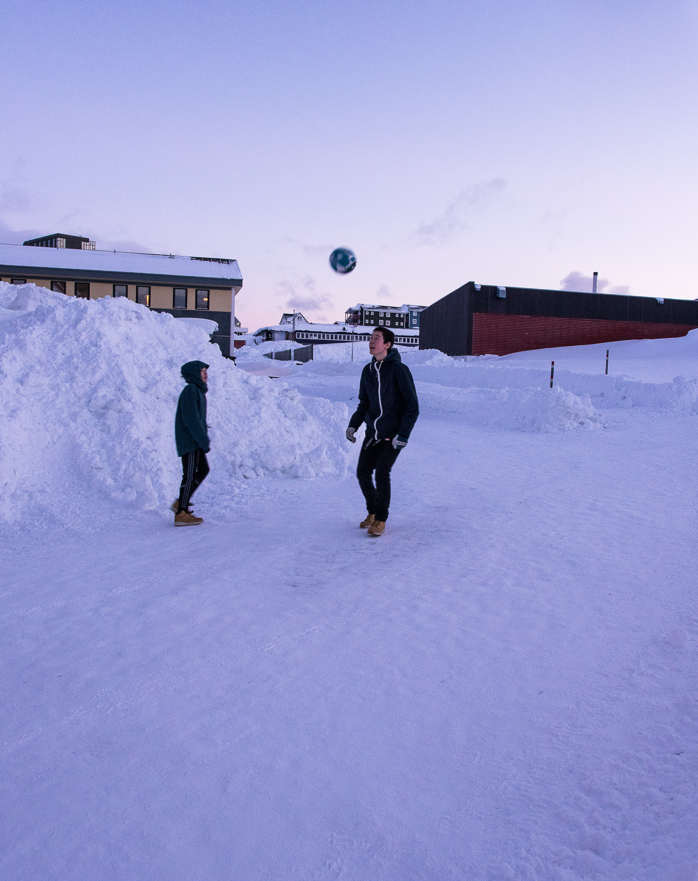 Children playing football Nuuk Greenland