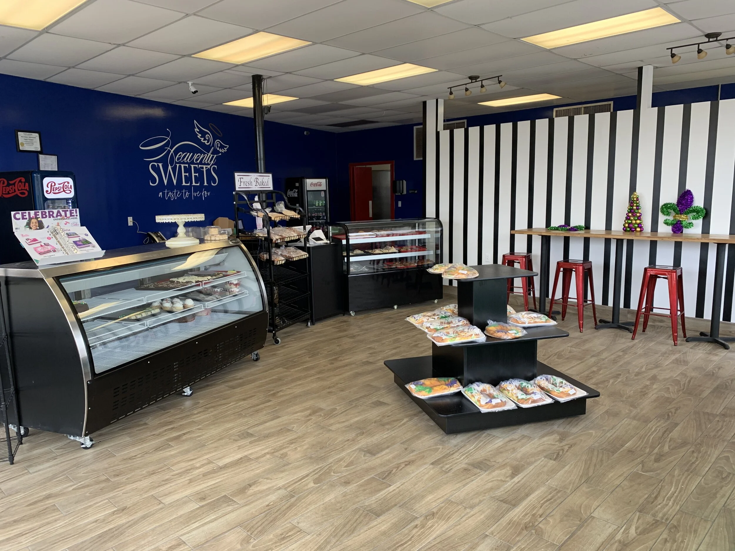 Freshly baked bread with ingredients on cutting board.