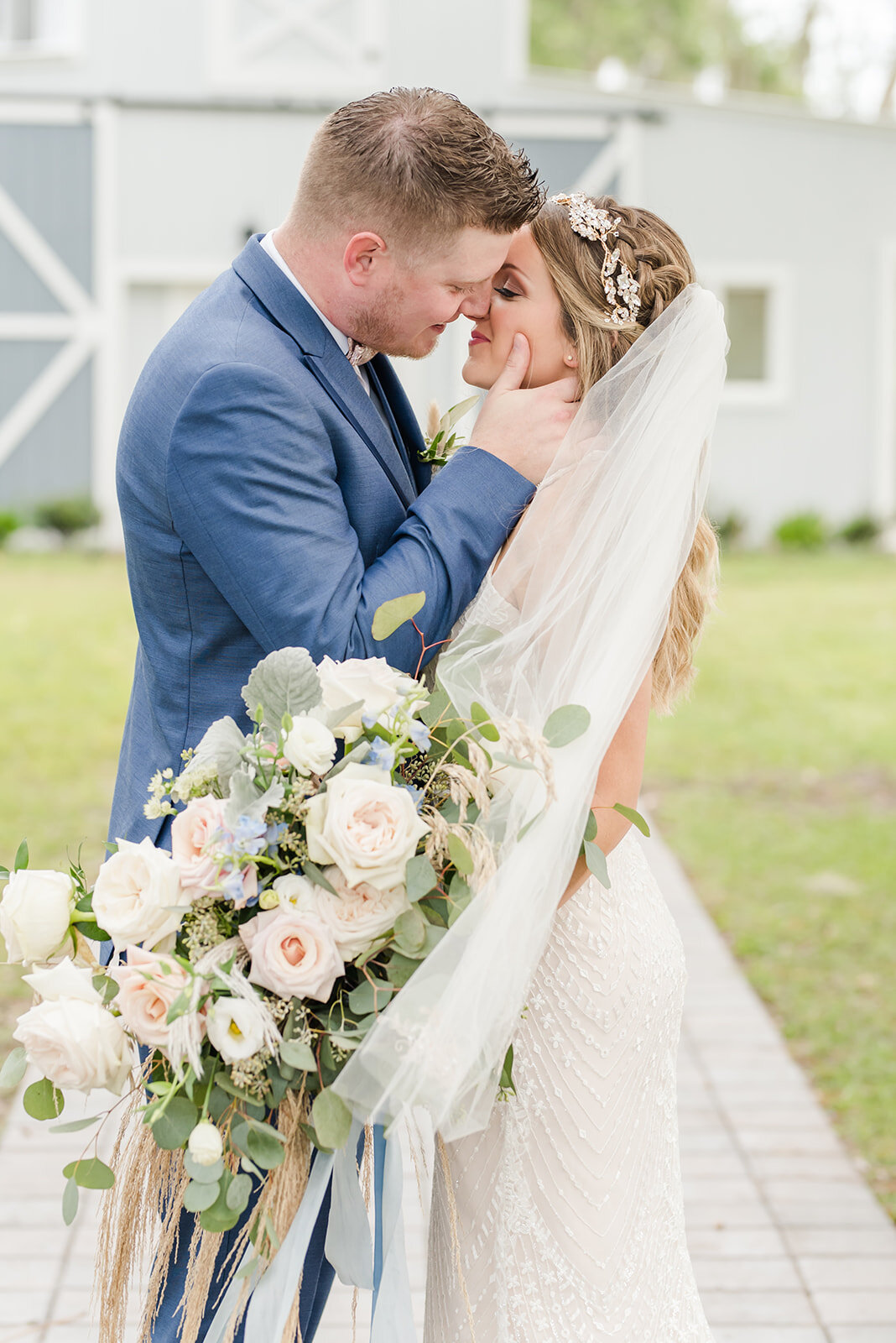 A sweet and beautiful country styled wedding with a barn venue and beautiful white floral bouquet.jpg