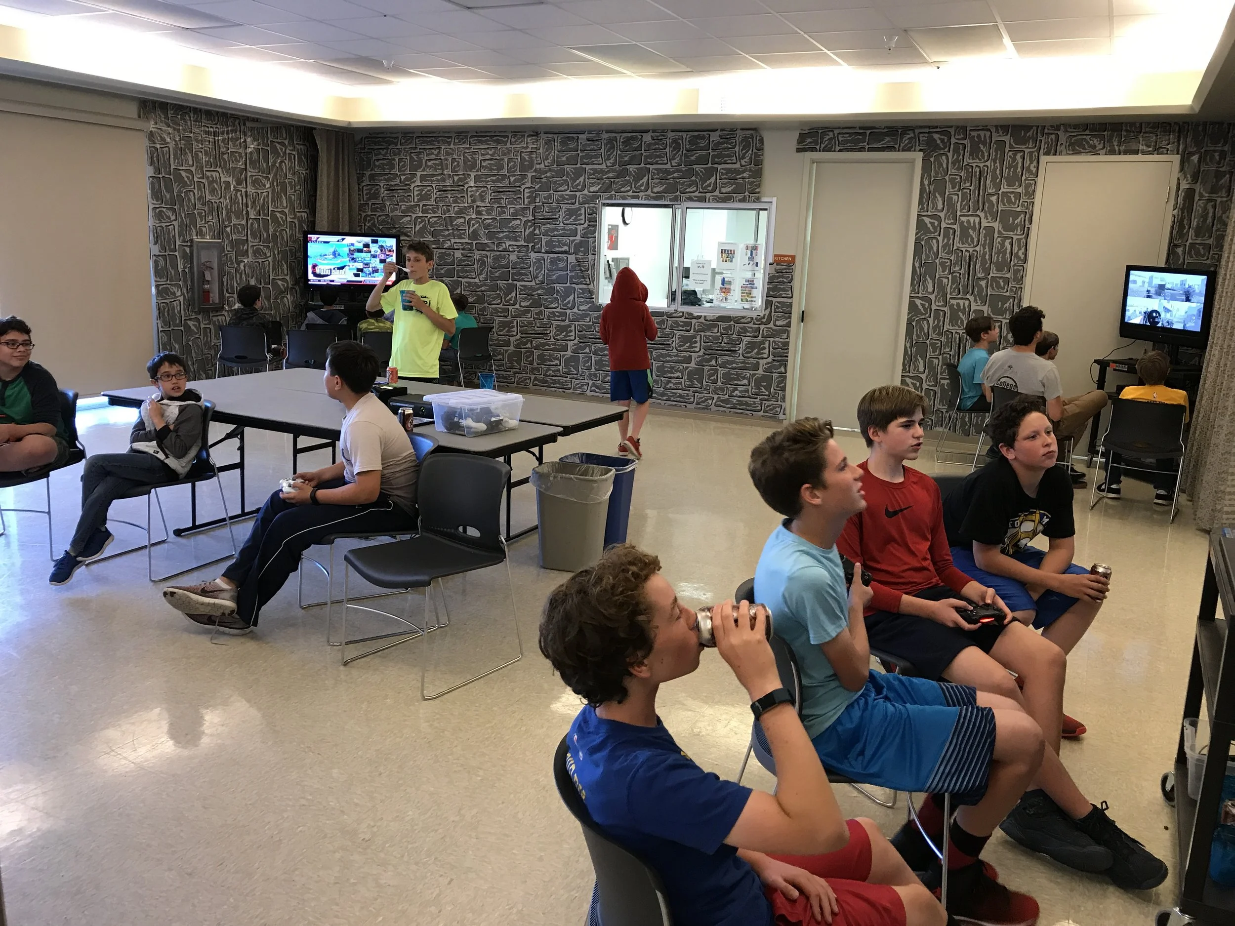 Teen boys celebrating a birthday, bar mitzvah, or other event