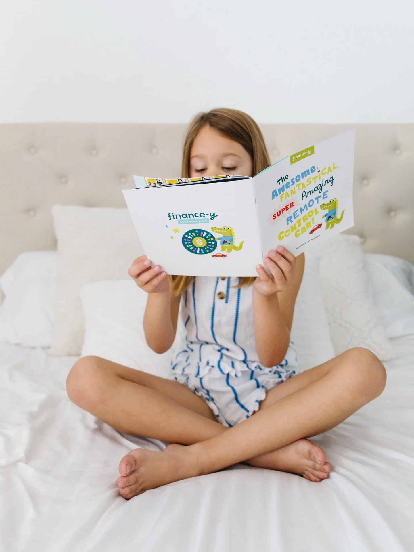 It&rsquo;s the best feeling when I get to work on design projects my own kids can use and love 💚 Here&rsquo;s Zoey reading the children&rsquo;s book I illustrated and playing with some of the fun assets I designed for @be_financey

Even cooler? I ge