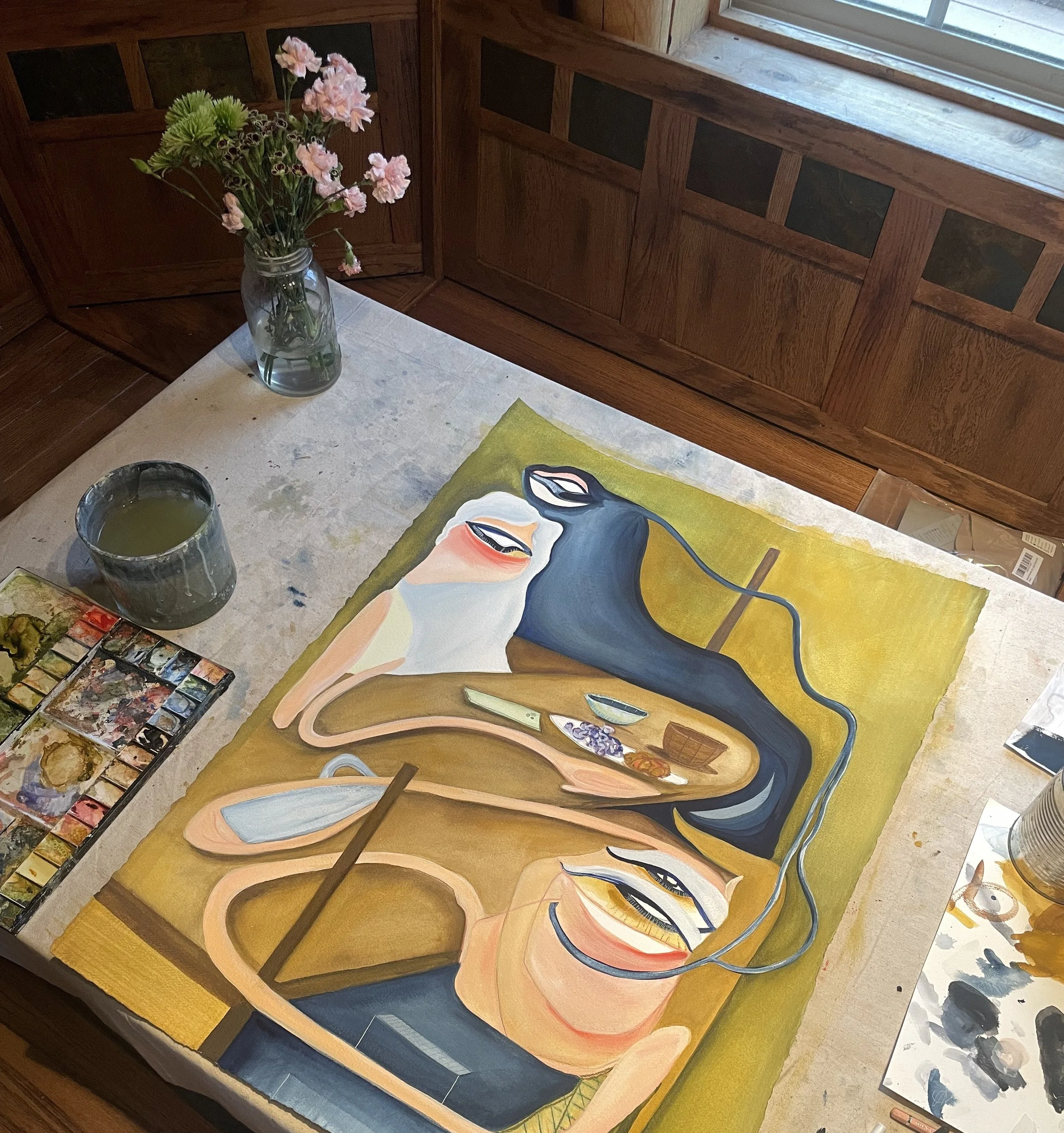 A painting of a woman with closed eyes, orange hair, and light skin, depicted in a stylized manner on a canvas, surrounded by art supplies and unfinished artwork.