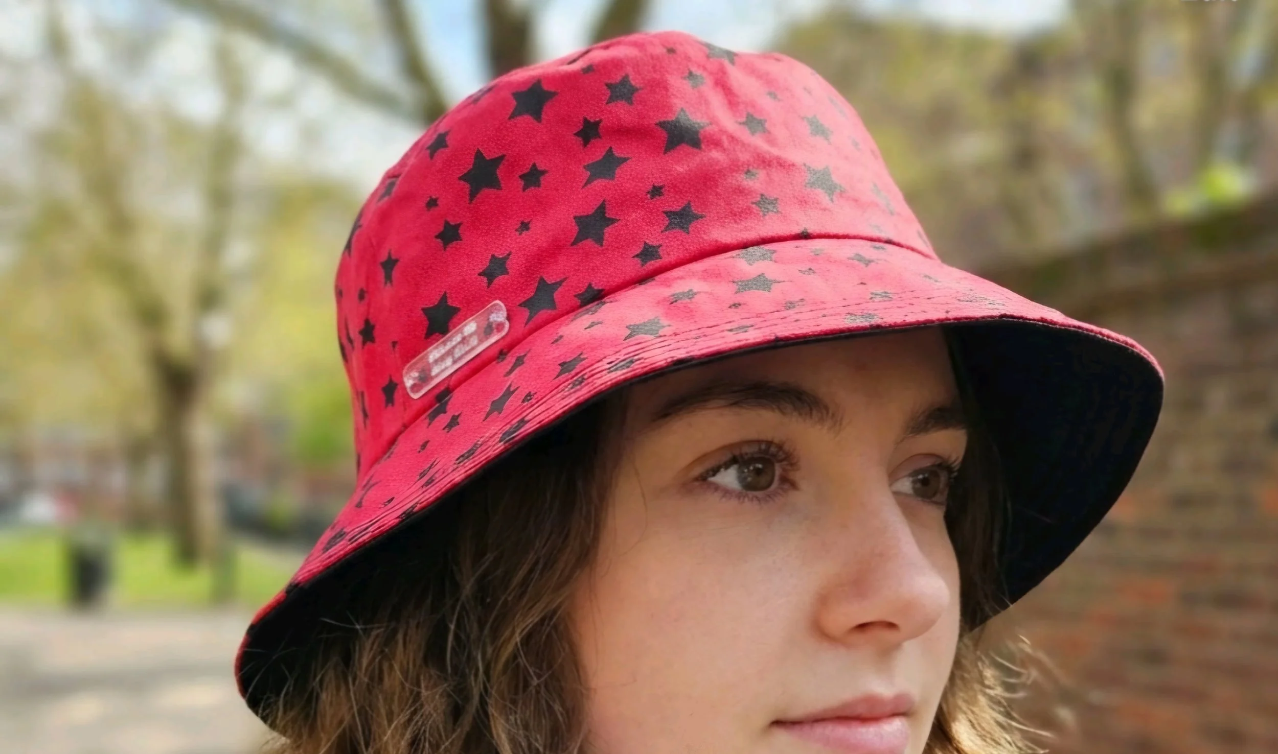 festival  summer   reversible bucket hat   inclusive fun red with black stars