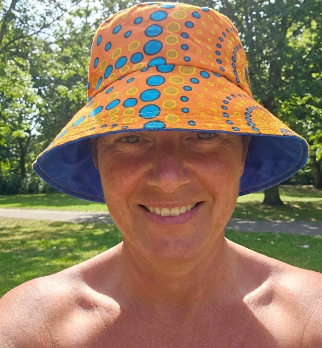 festival  summer   reversible bucket hat   inclusive fun acid pop orange