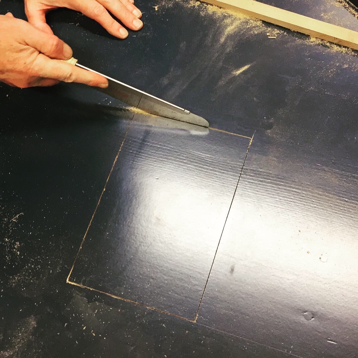 Cutting an access door in the bottom