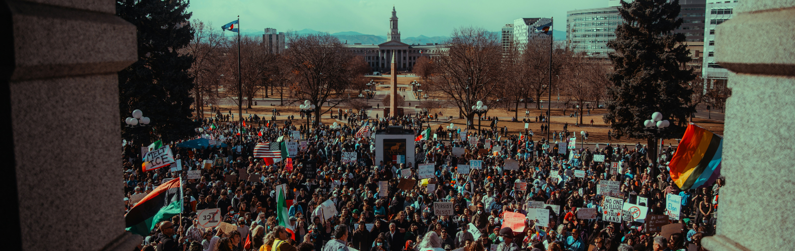 Protesters gather in Denver, Colorado, during a demonstration against immigration enforcement.