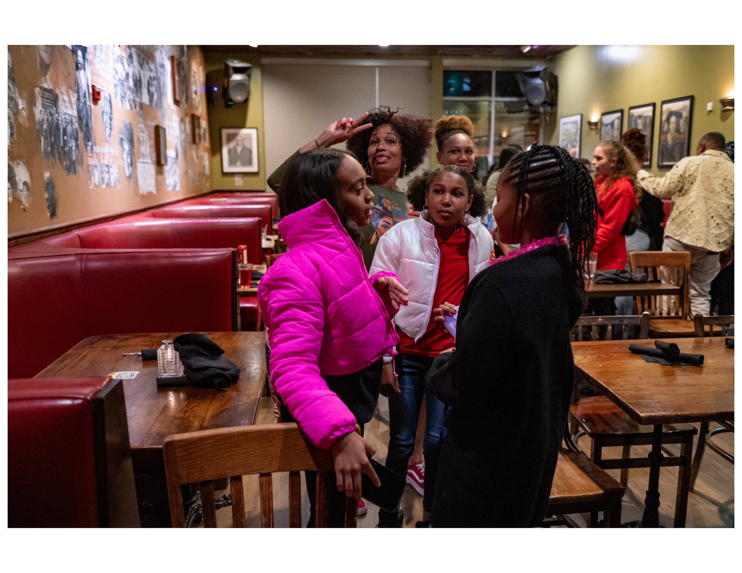   Family fun at an open mic event hosted by Words Beats &amp; Life Inc. at Busboys and Poets in Washington, DC. Photographer/Victoria Ford  