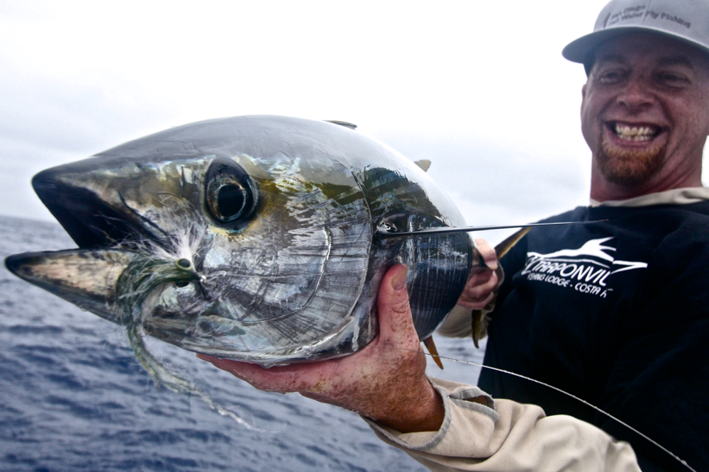 Alex Beck and a Yellowfin caught on the fly.