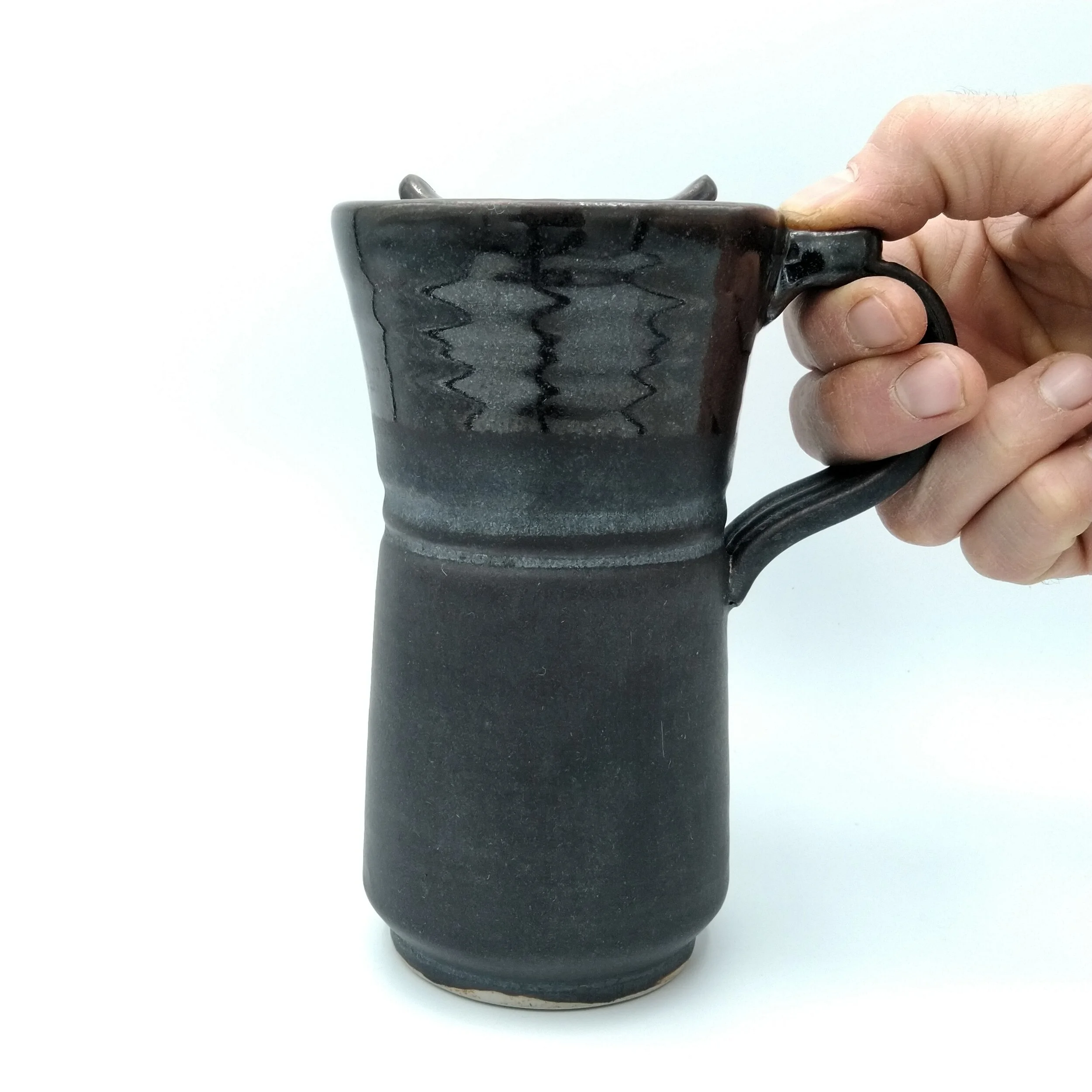 Travel Mug - Full Size Black Side. Hand.jpg