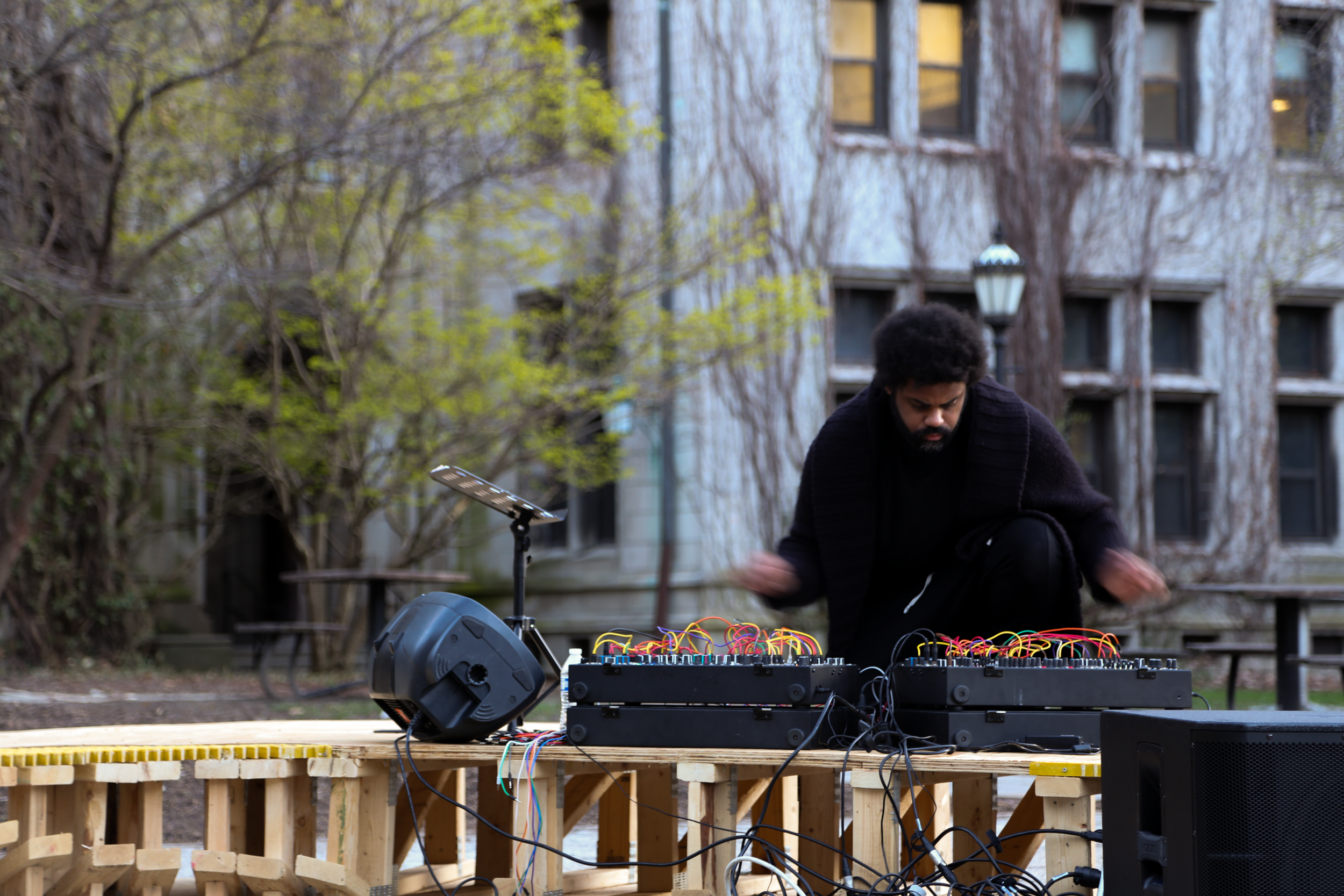  Kevin Beasley performs "Plastic/Soul/Capture/Play - Notes in Public" as part of&nbsp; Jessica Stockholder: For Events  in Hutchinson Courtyard at the University of Chicago on&nbsp;Saturday, April 6, 2024. Photo by Natalia Granquist. 