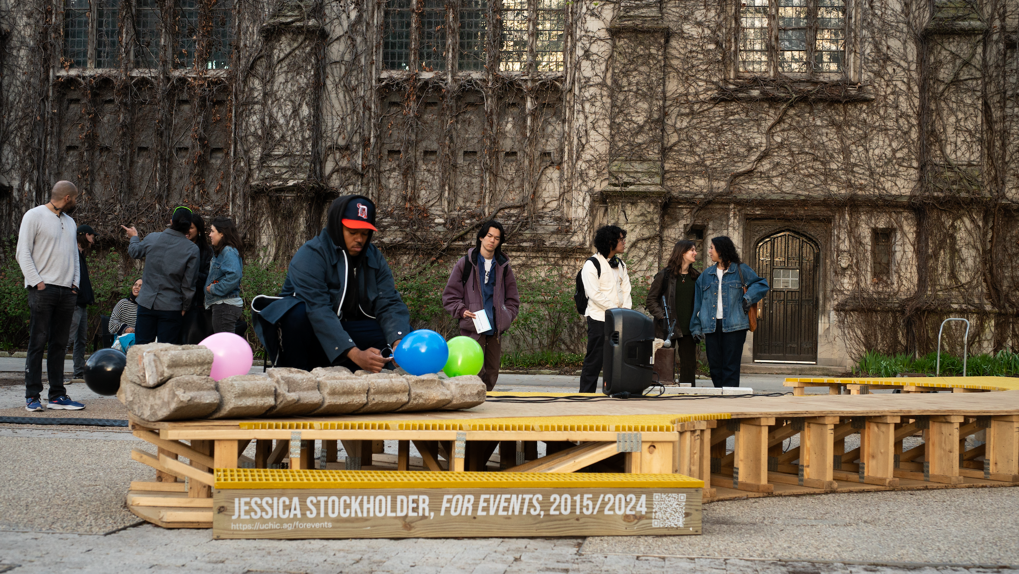  Devin T. Mays performs " In Concert #1: Hold, Weight " as part of&nbsp; Jessica Stockholder: For Events  in Hutchinson Courtyard at the University of Chicago on&nbsp;Tuesday, April 8, 2024. Photo by Charleigh Flynn. 