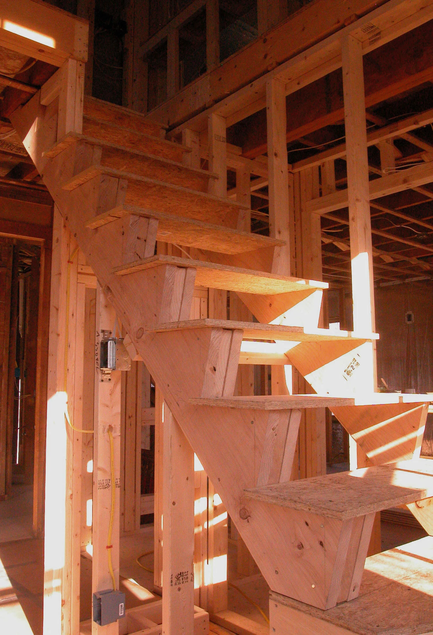 rough framing for custom staircase angled riser