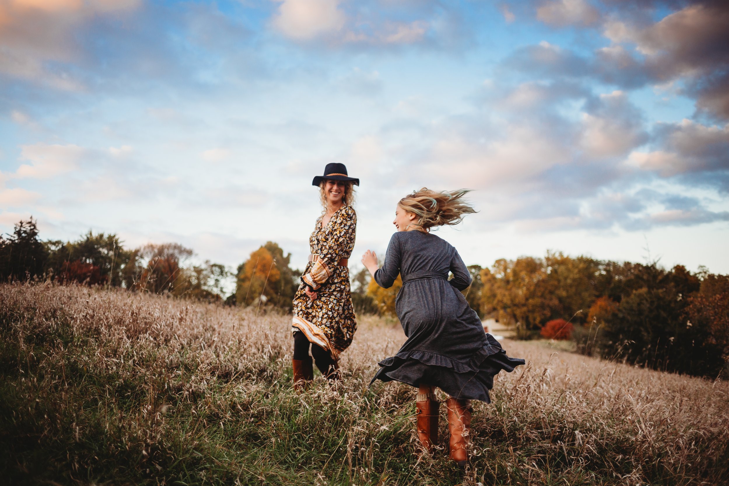  Mother and daughter dance together in a field captured by professional Teala Ward Photography in IL. dancing family Spring Valley #tealawardphotography #tealawardfamilies #springvalleyillinois #springvalleyphotographers #Illinoisfamilyphotographer 