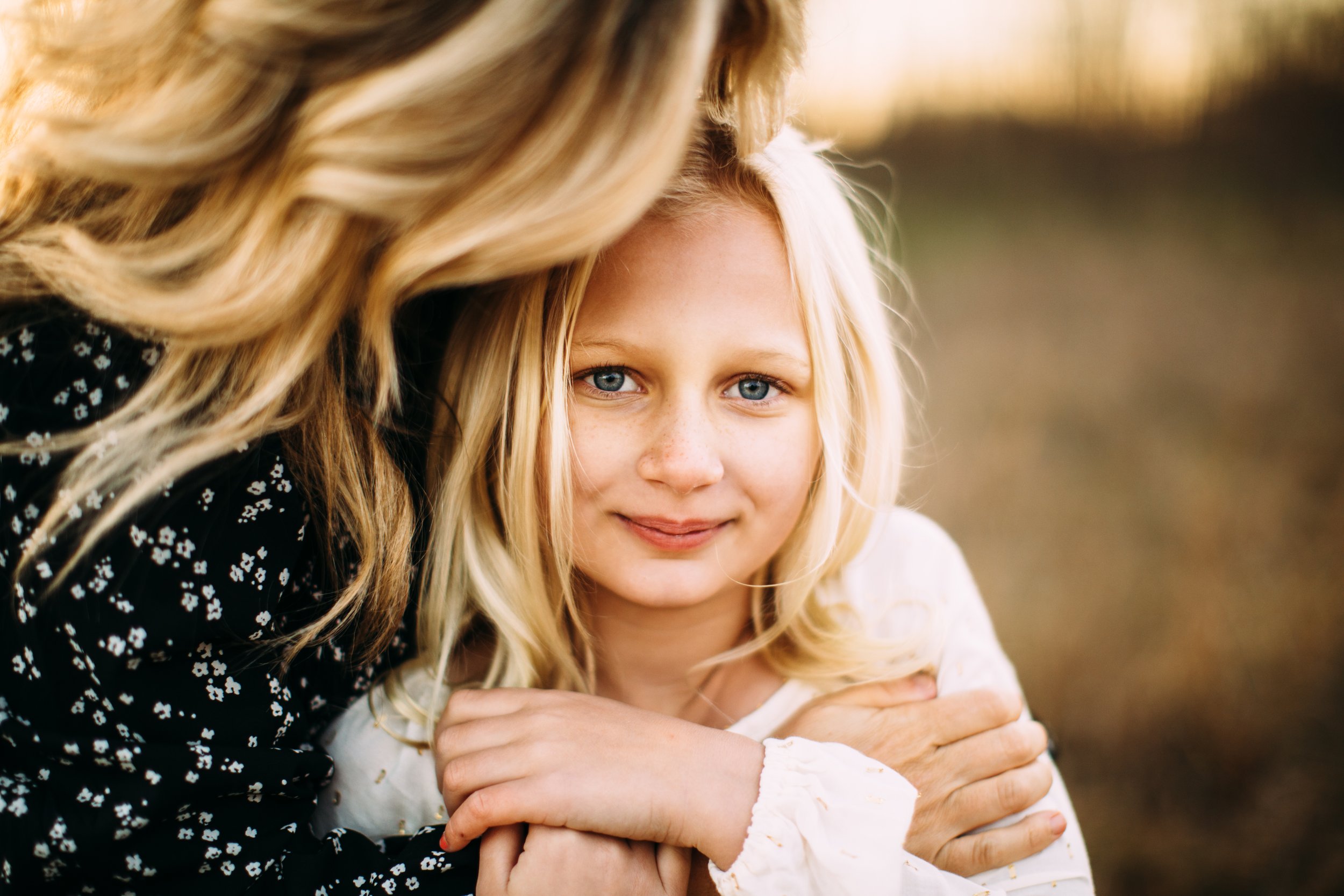  Close-up portrait of a young blonde girl during family pictures with Teala Ward Photography. daughter style ideas blonde child #TealaWardPhotography #TealaWardFamilies #StarvedRockStatePark #BuffaloRockPhotographers #UticaIllinoisphotographers 