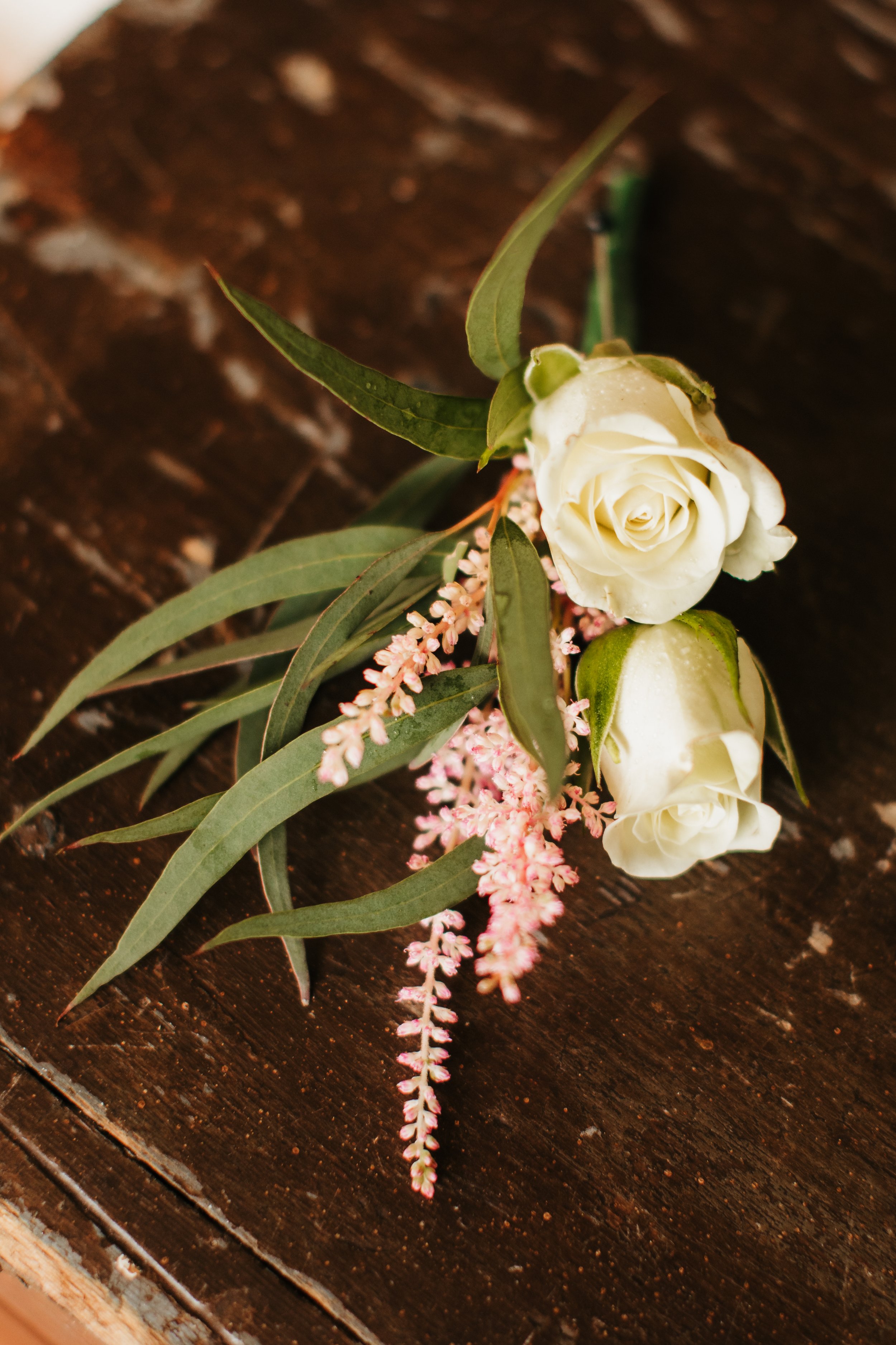  Small white spray roses and delicate pink flowers for a boutonniere for an intimate wedding in Illinois #TealaWardPhotography #illinoisphotographer #princetonillinois #weddingphotographer #intimatewedding 
