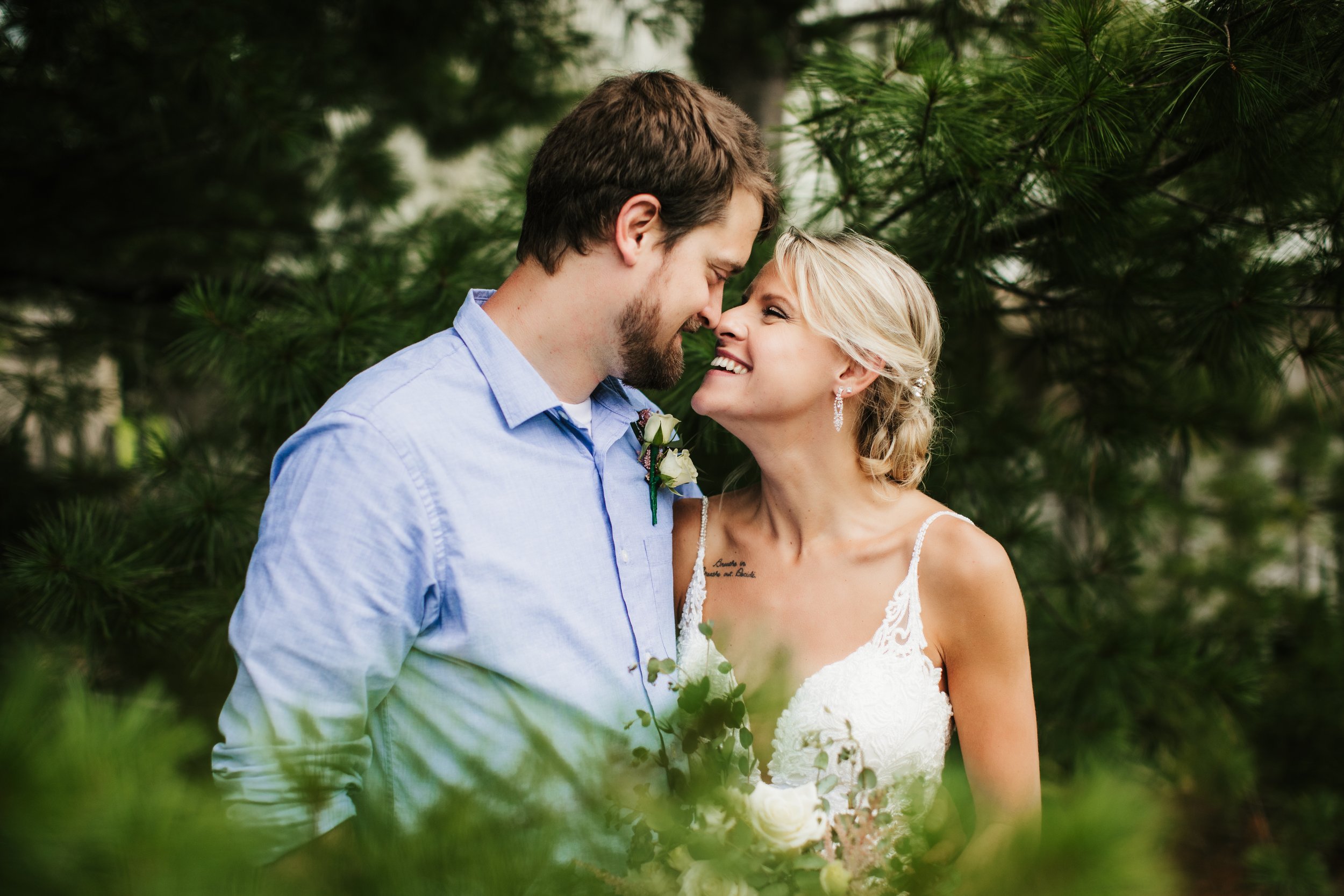  Husband and wife pose together for newlywed photos after their intimate at home wedding ceremony lace spaghetti strapped dress #TealaWardPhotography #illinoisphotographer #princetonillinois #weddingphotographer #intimatewedding 