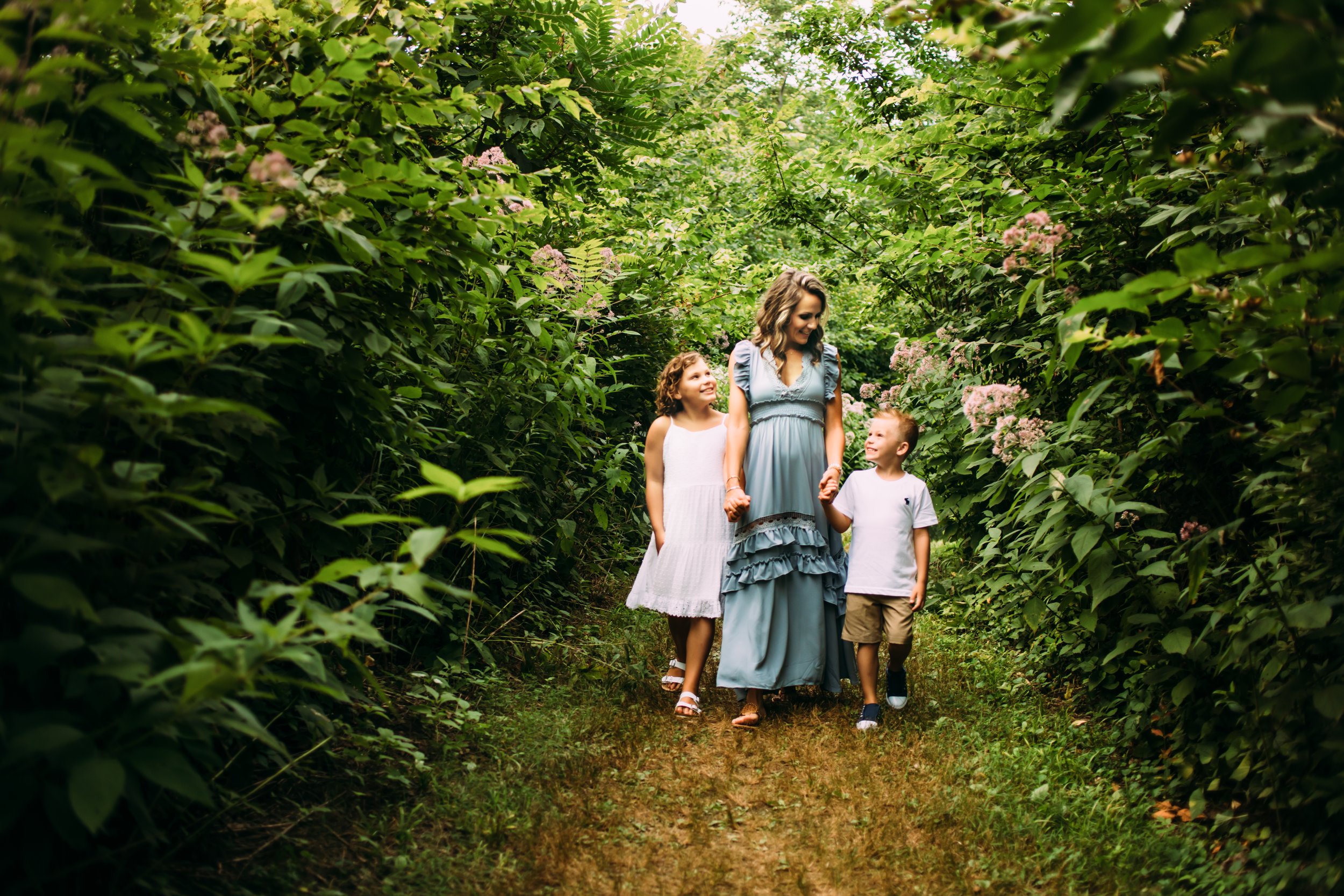  Dynamic family photography of a mother and her children in a green tree hideout by Teala Ward Photography. Illinois families #motherhood #mommapics #TealaWardPhotography #TealaWardFamilies #IllinoisPhotographers #IllinoisFamilyPhotography 