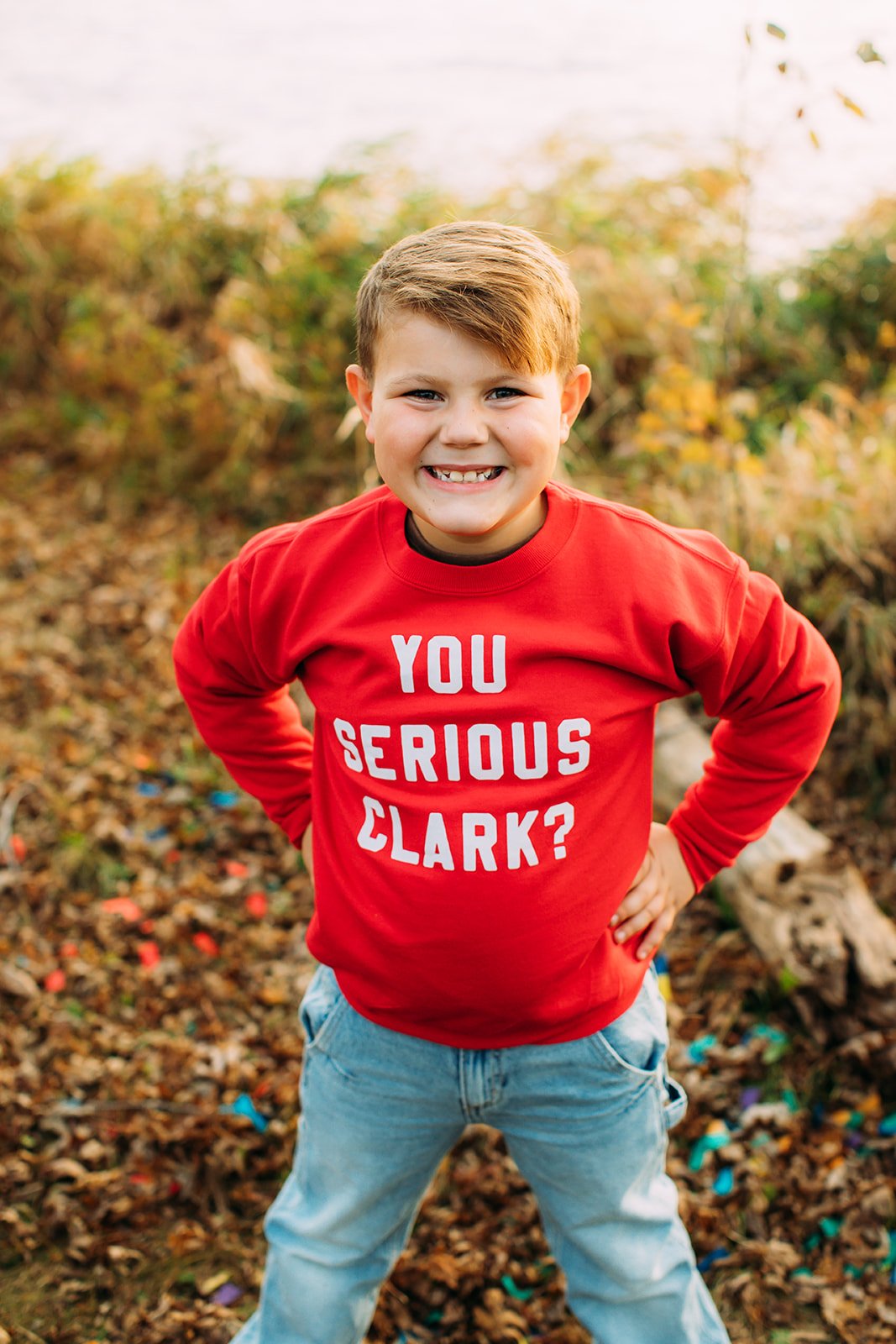  A young boy is wearing a "you serious Clark?" sweater for winter-themed family pictures by Teala Ward Photography. funny Xmas pics #TealaWardPhotography #TealaWardFamilies #holidayfamilypics #photography #Illinoisfamilyphotography #familysession 