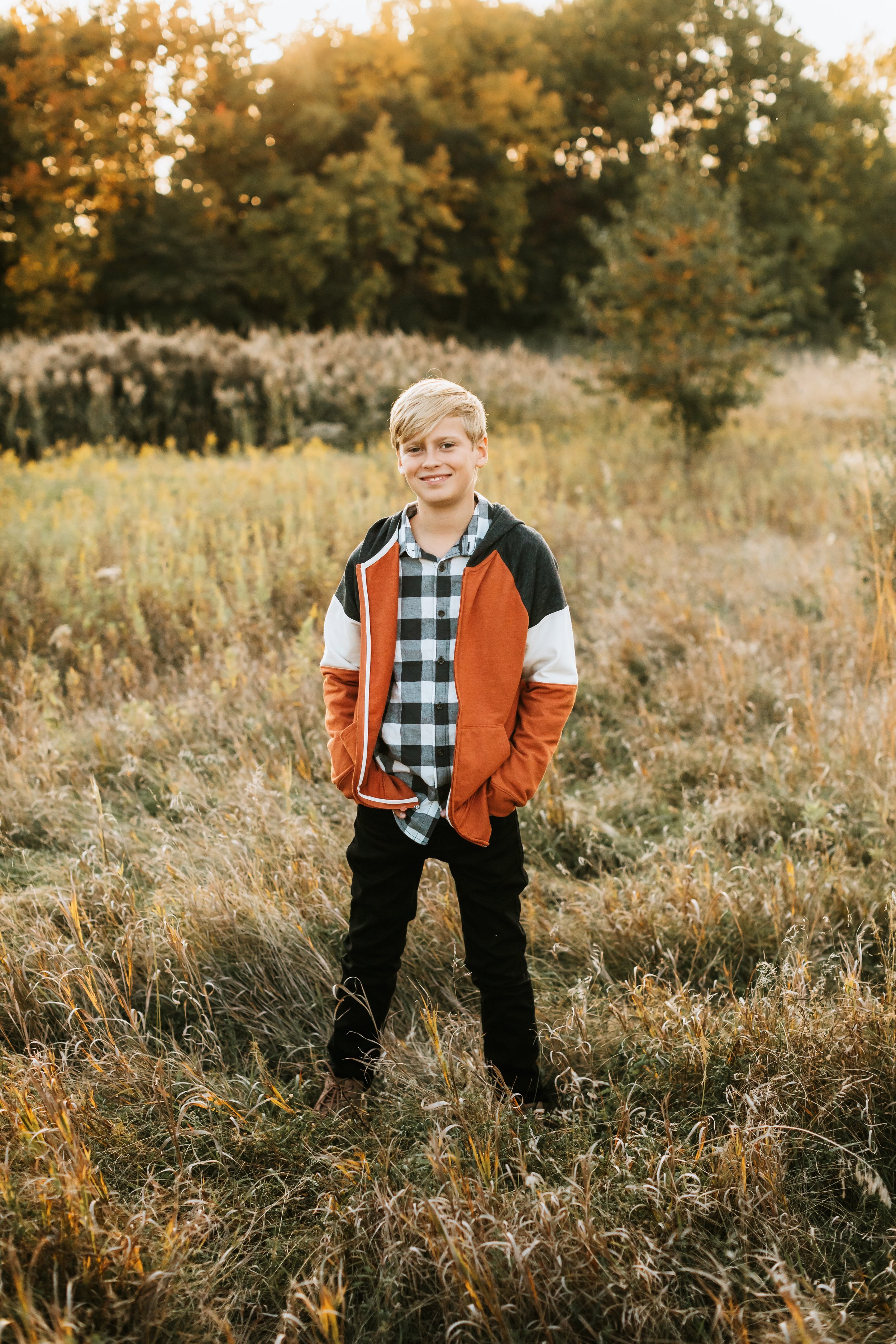  Candid portrait of a boy in a stylish shirt and jacket by Teala Ward Photography. stylish boy style for winter #TealaWardPhotography #TealaWardFamilies #IllinoisValleyfamilypics #fursibiling #Illinoisfamilyphotography #brother&amp;sister 