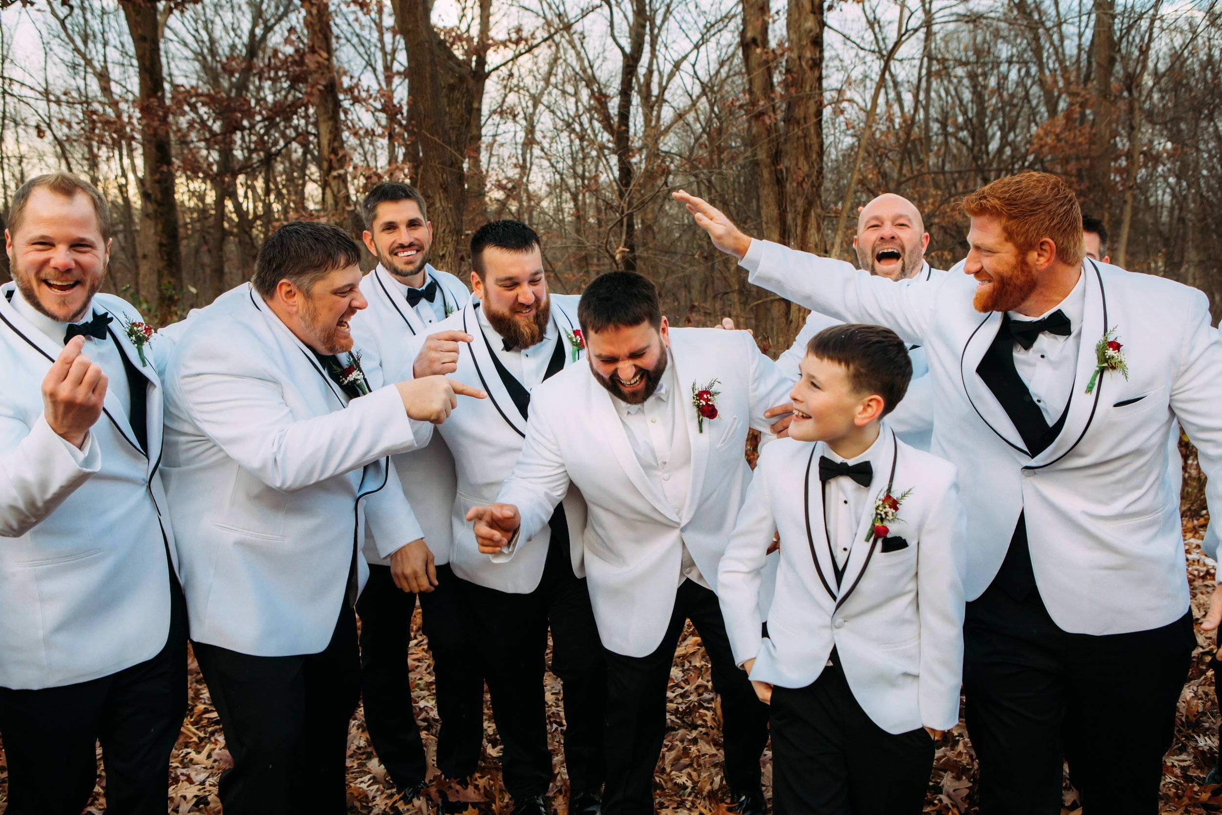  Teala Ward Photography captures the groomsmen having fun together before the wedding. groomsmen group party before wedding #TealaWardPhotography #TealaWardWeddings #LaSalleWedding #churchwedding #Illinoisweddingphotographer #LaSalle,IL 