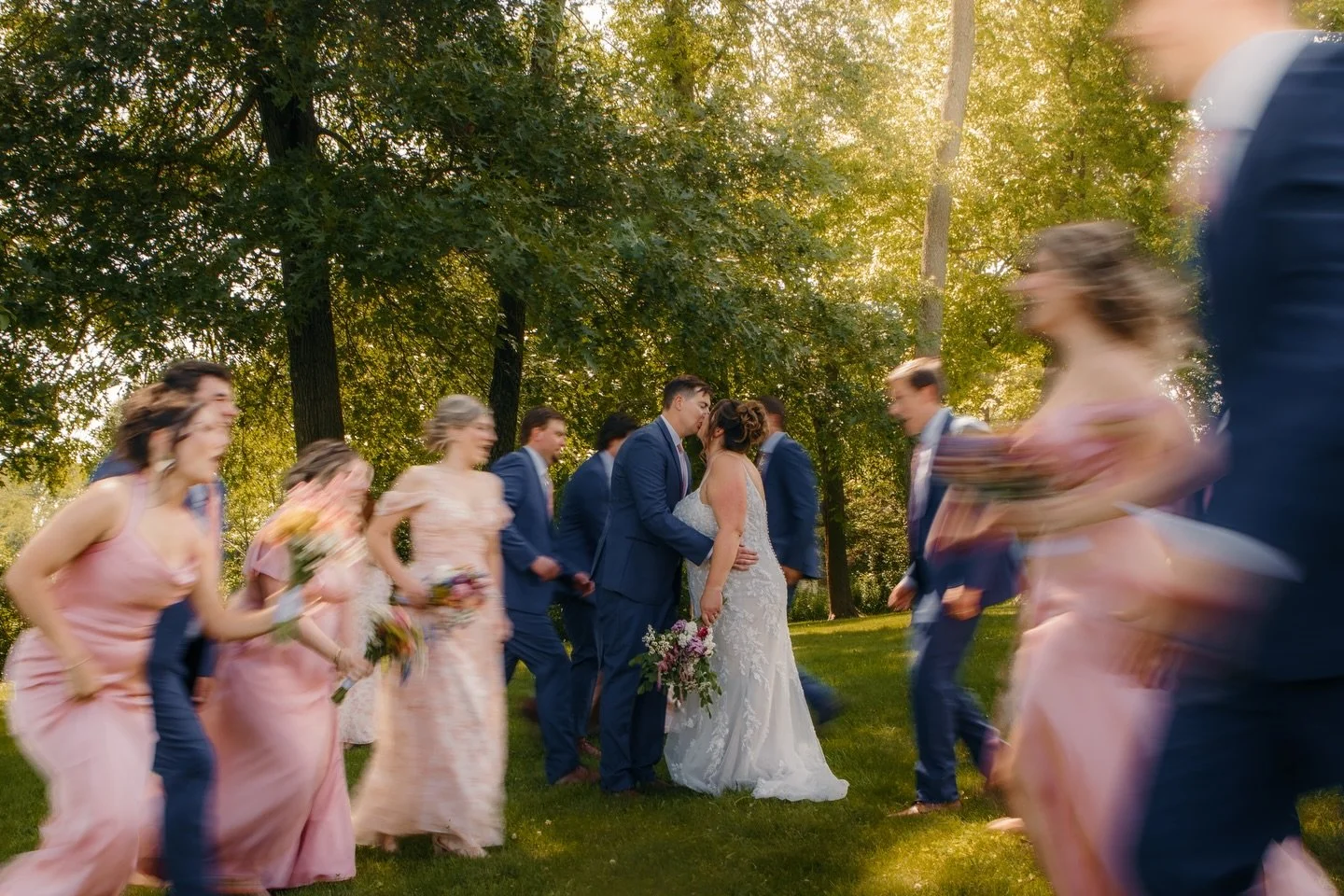 This photo was made on purpose. It was planned as a way to search for a feeling that shows up on most wedding days, whether you want it to or not. That rush, that joy, the blur of people and sound.

I know motion blur is having a moment right now, an