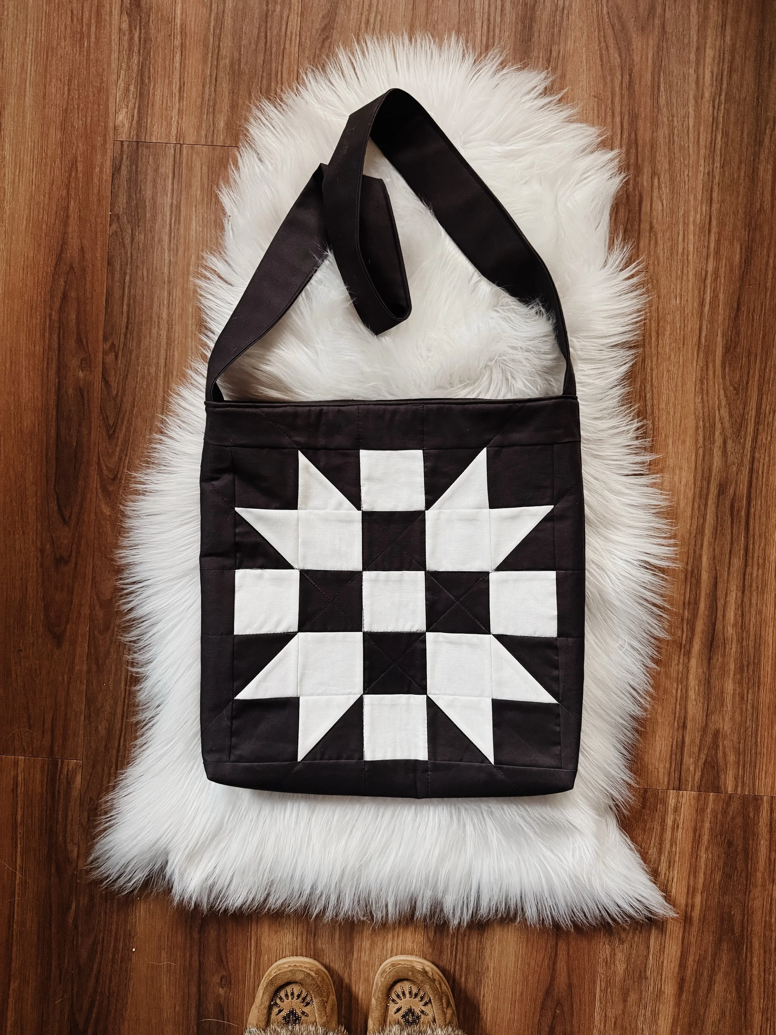 There&rsquo;s something about traditional quilt blocks that never gets old. The Churn Dasher block has been around for generations, and I love how timeless it feels worked into an everyday tote bag you can actually use.

This pattern was designed for