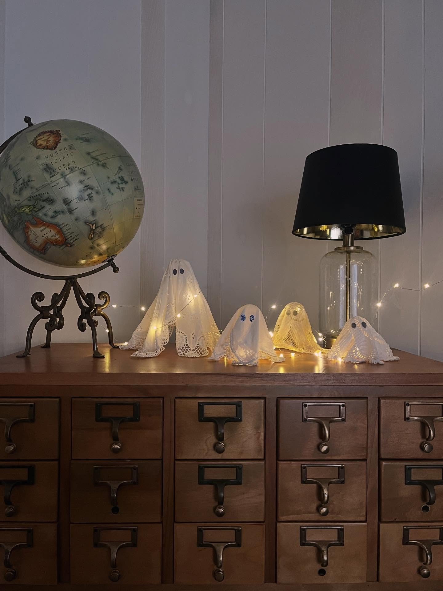 Multiple loves of my life combine (thrifting, vintage textiles, Halloween) in this super easy project! I can&rsquo;t remember my first source for this, but they are truly all over the internet. 

I kept an eye out for interesting doilies while thrift