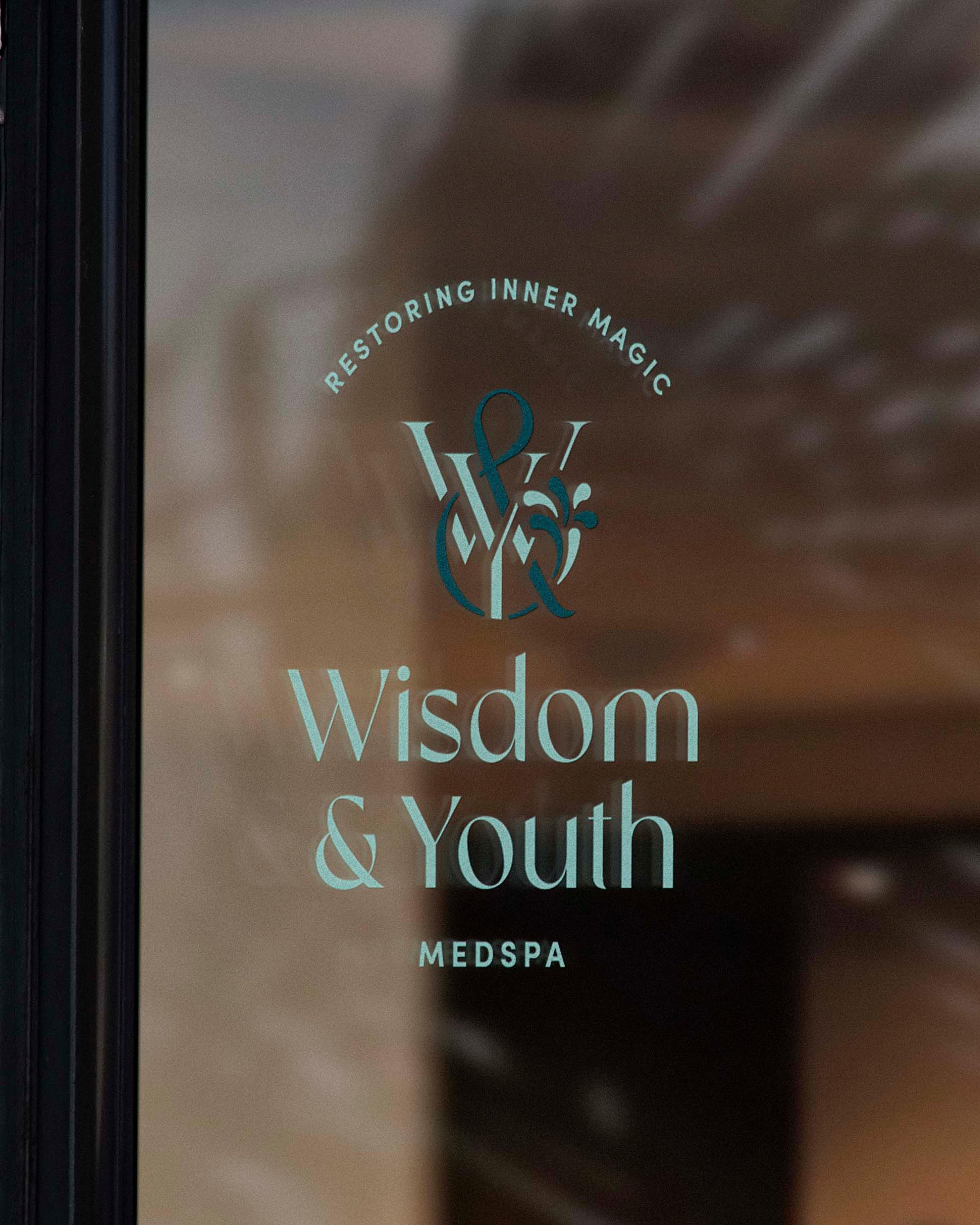 Wisdom &amp; Youth logo by Creme, multicolor version