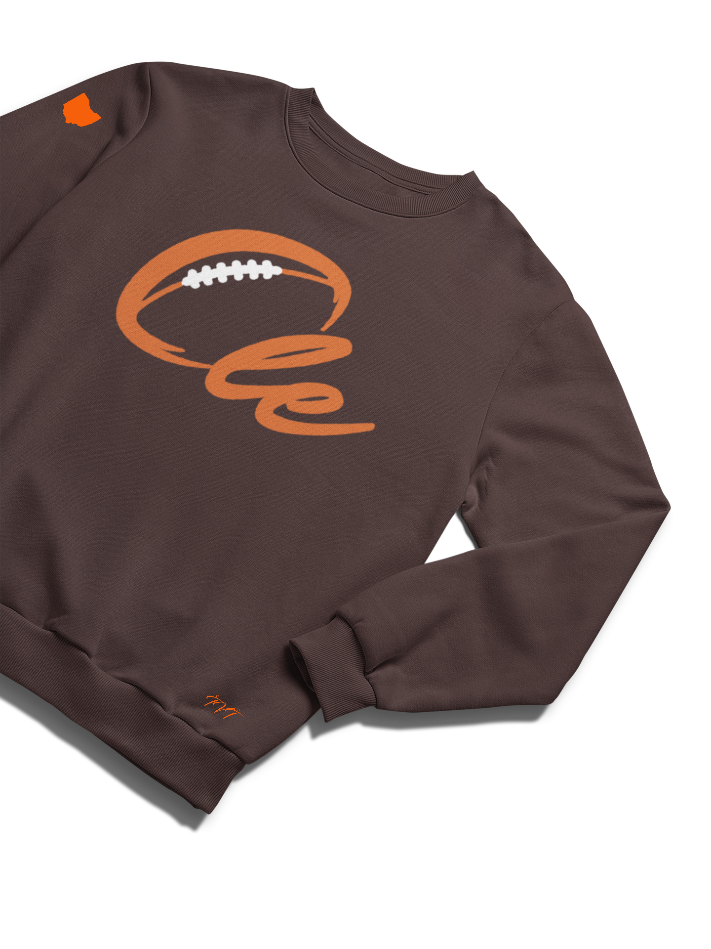 SWEATSHIRT MOCKUP OF A CLE BROWN (ORANGE) WITH A FOLDED SLEEVE ON A SOLID WHITE SURFACE BACKDROP.png