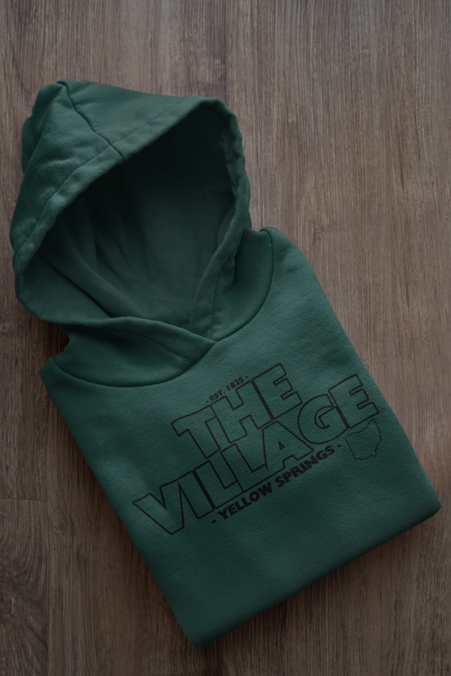 mockup-of-a-folded-customizable-hoodie-placed-on-a-wooden-surface-33874a (24).png