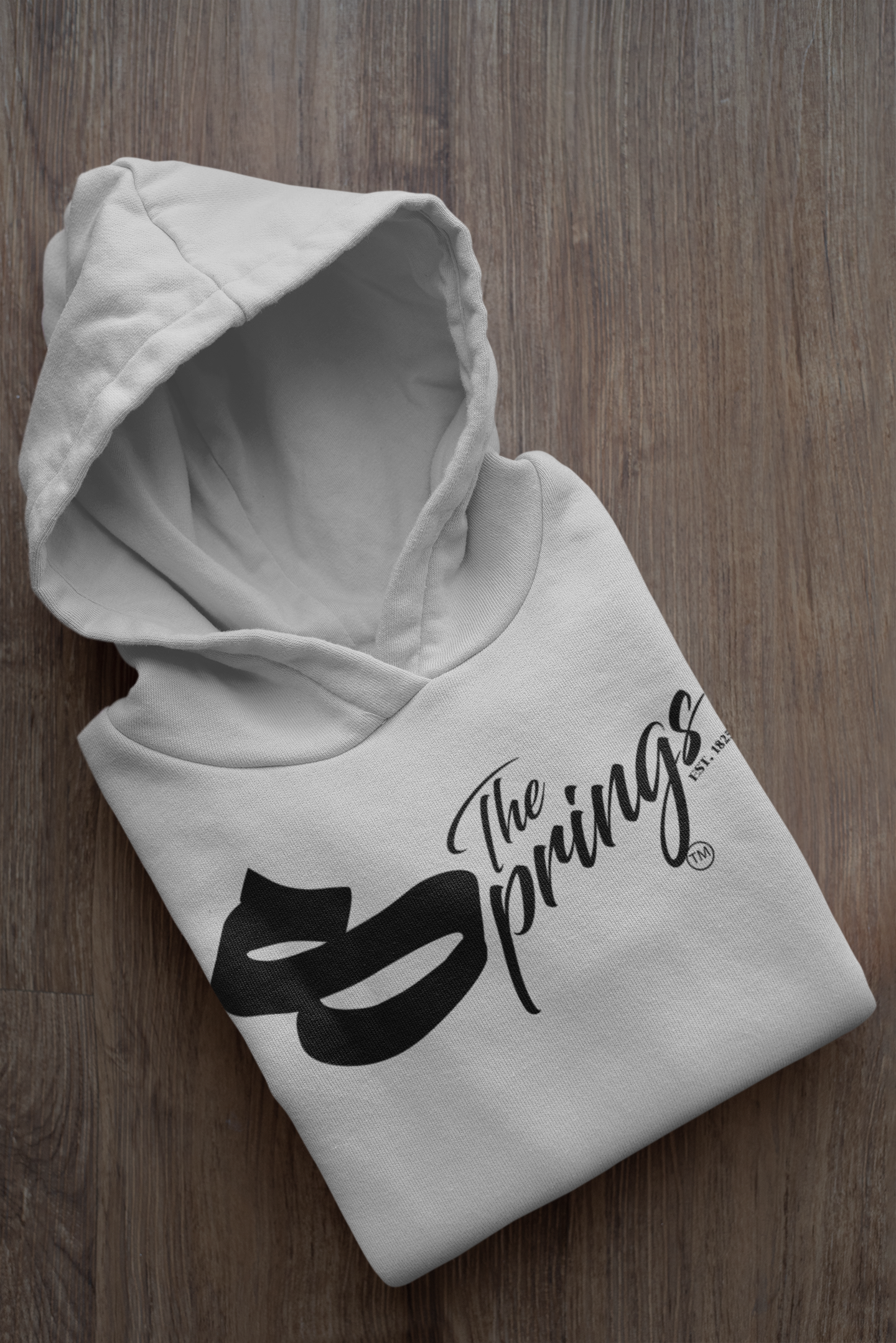 mockup-of-a-folded-customizable-hoodie-placed-on-a-wooden-surface-33874a (14).png