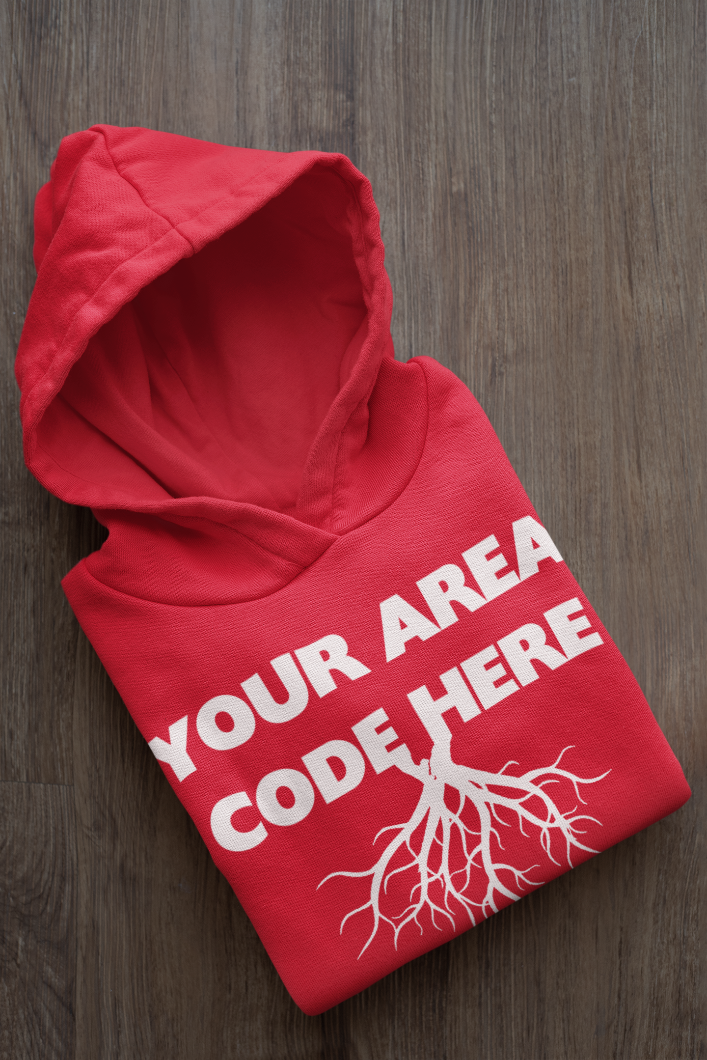 mockup-of-a-folded-customizable-hoodie-placed-on-a-wooden-surface-33874a.png