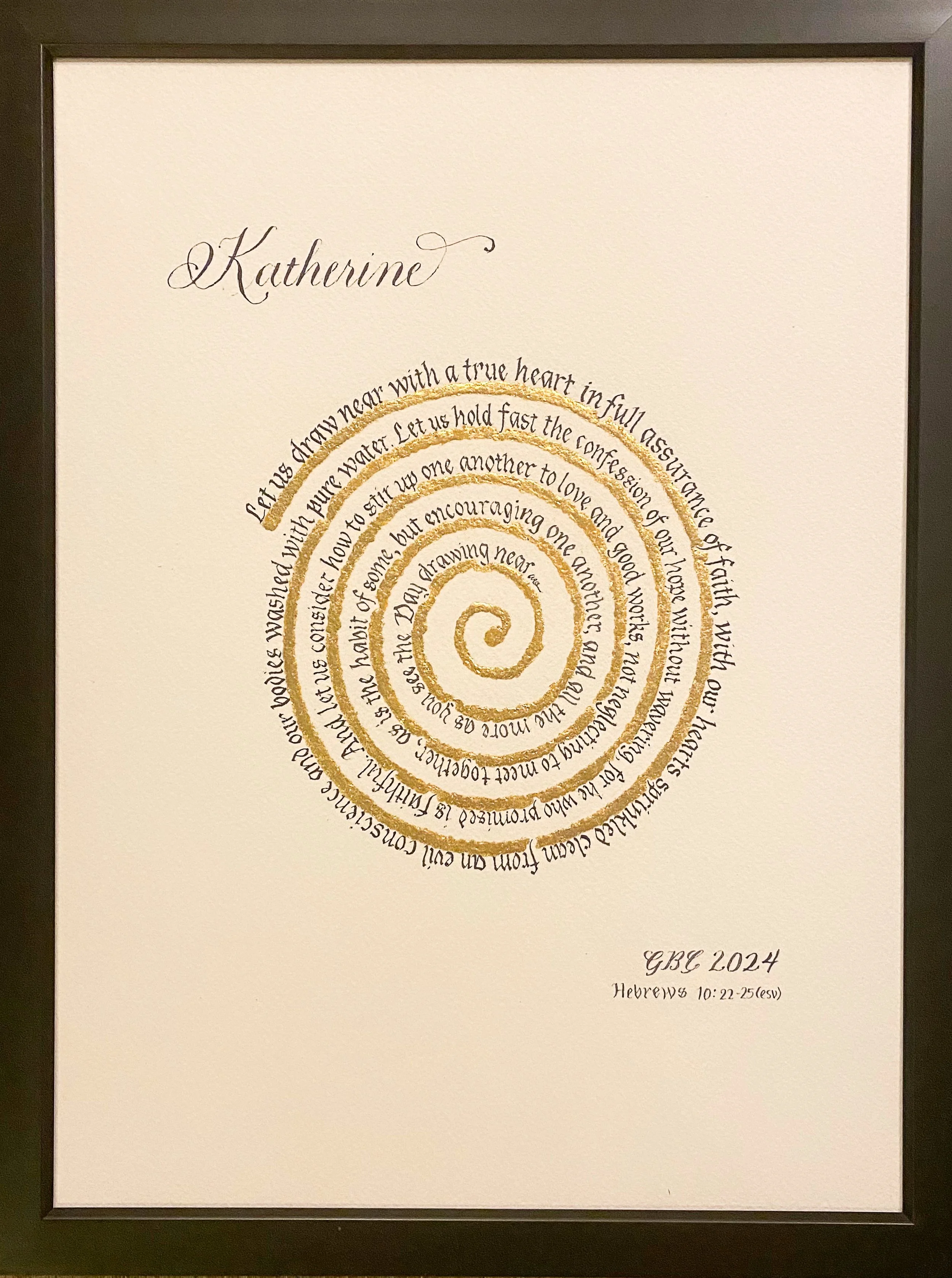 Writing in spiral. Lettering in spiral is gothicized italic. Gold leaf applied to spiral design. 