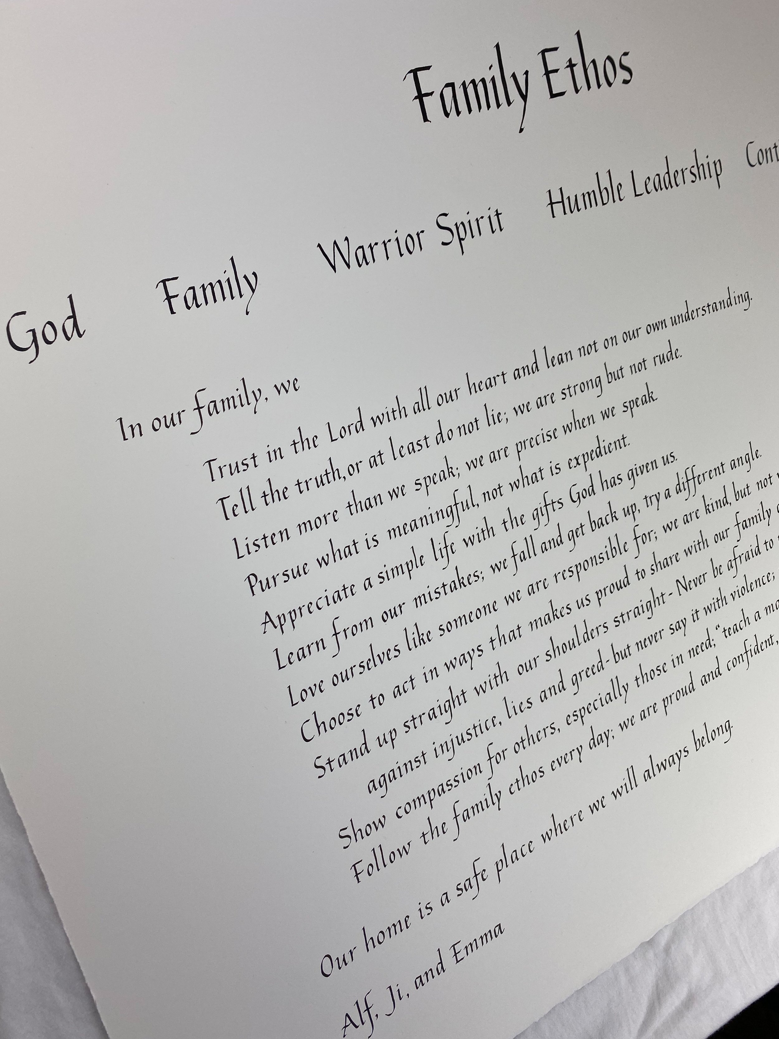 Family mission statement written in Italic. For large designs like this, italic or foundational hand are beautiful ways for the large design to be read from across the room. 