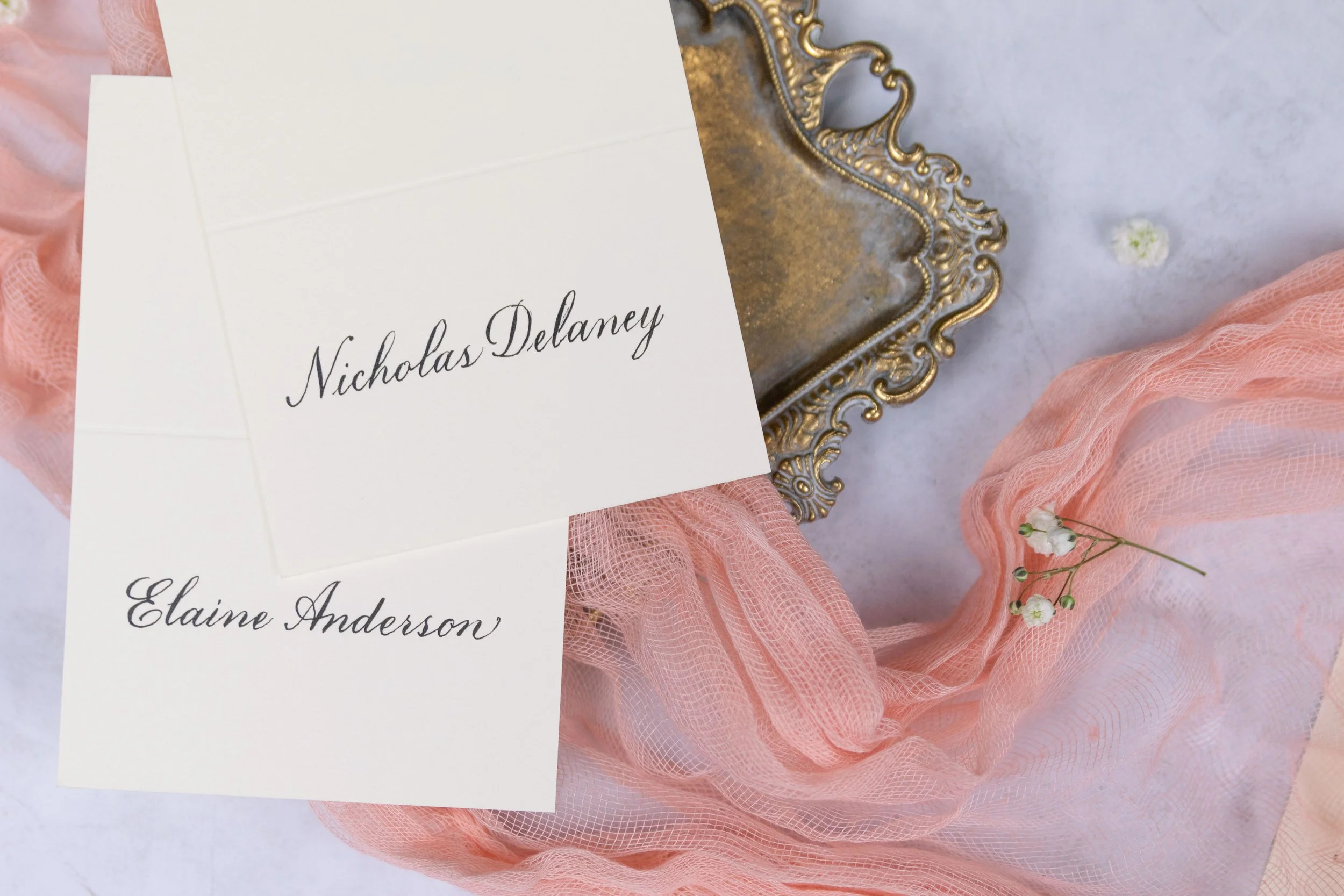 Calligraphy in Houston TX shows a wedding place card with the names. 