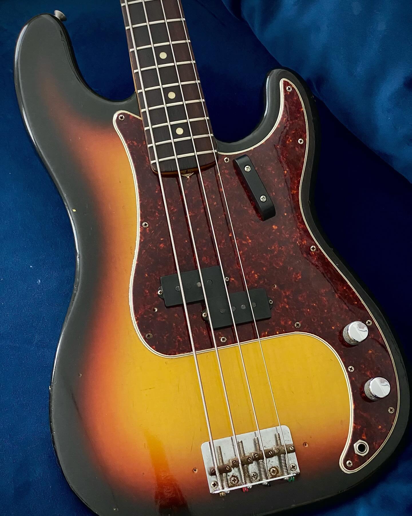 Something of the four string variety for Guitar Of The Week this time. A fantastic all original &lsquo;66 Fender Precision Bass in classic Sunburst. This one has a nice dark Brazilian rosewood board. A good P Bass is all you really need in the four s