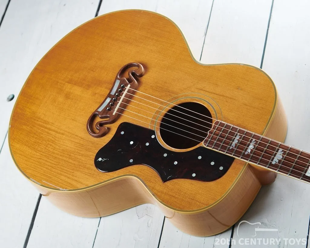 King of the flat-tops. Here is a &lsquo;92 Gibson J-200 in classy natural finish. Built in the Montana factory during what many consider the &lsquo;good wood&rsquo; period. This example had been a workhorse during its 33 years for good reason. Favour