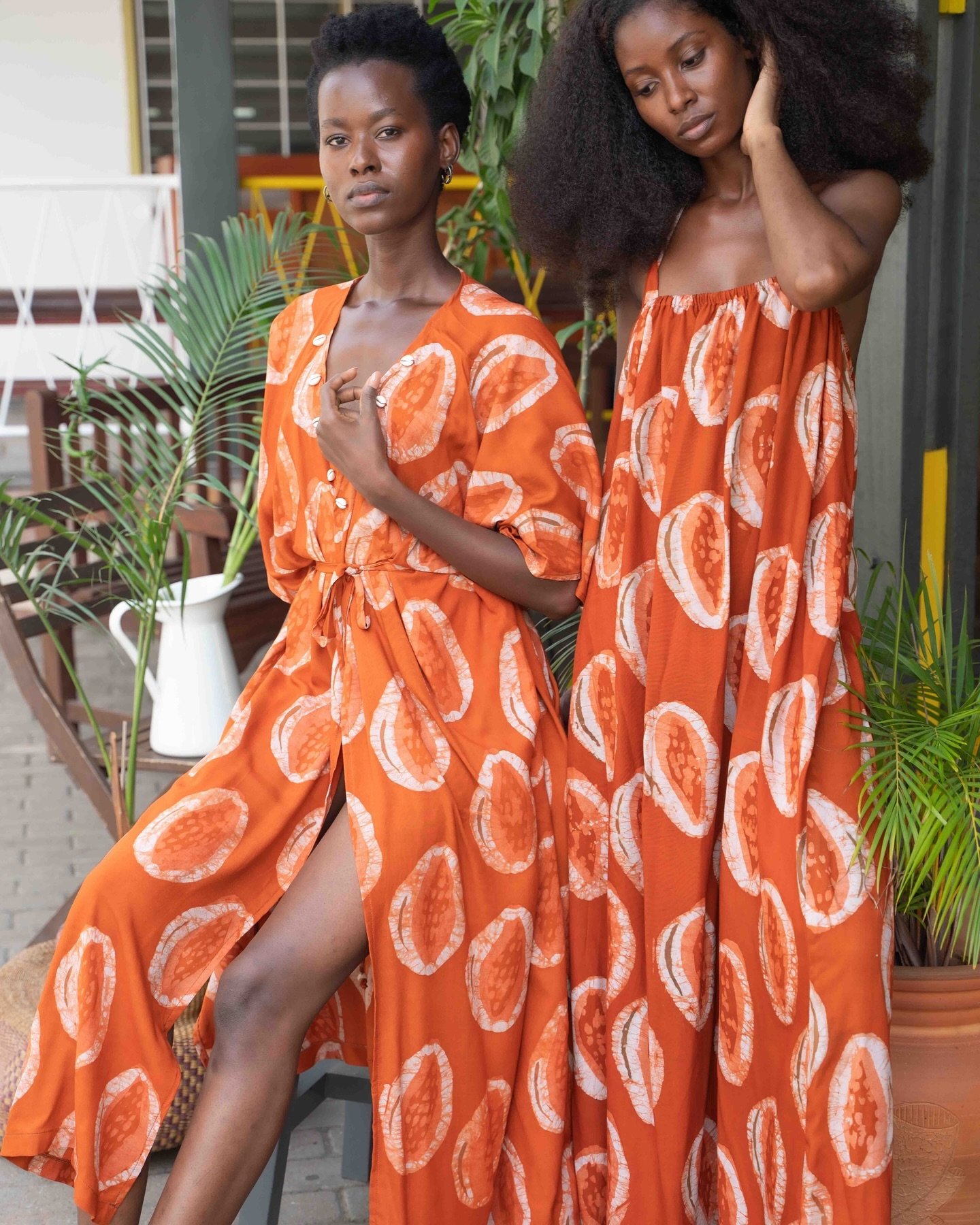 Kimono or a dress ? Both !!! Our flowy dresses are coming to you soon in more beautiful prints 🧡 
.
.
.
#orangedresses #prints #colorfulfashion #madeinghana🇬🇭 #madeinafrica🌍 #batik #handdyedfabric #slowfashion #madetolast #kimonos #resortwearbran