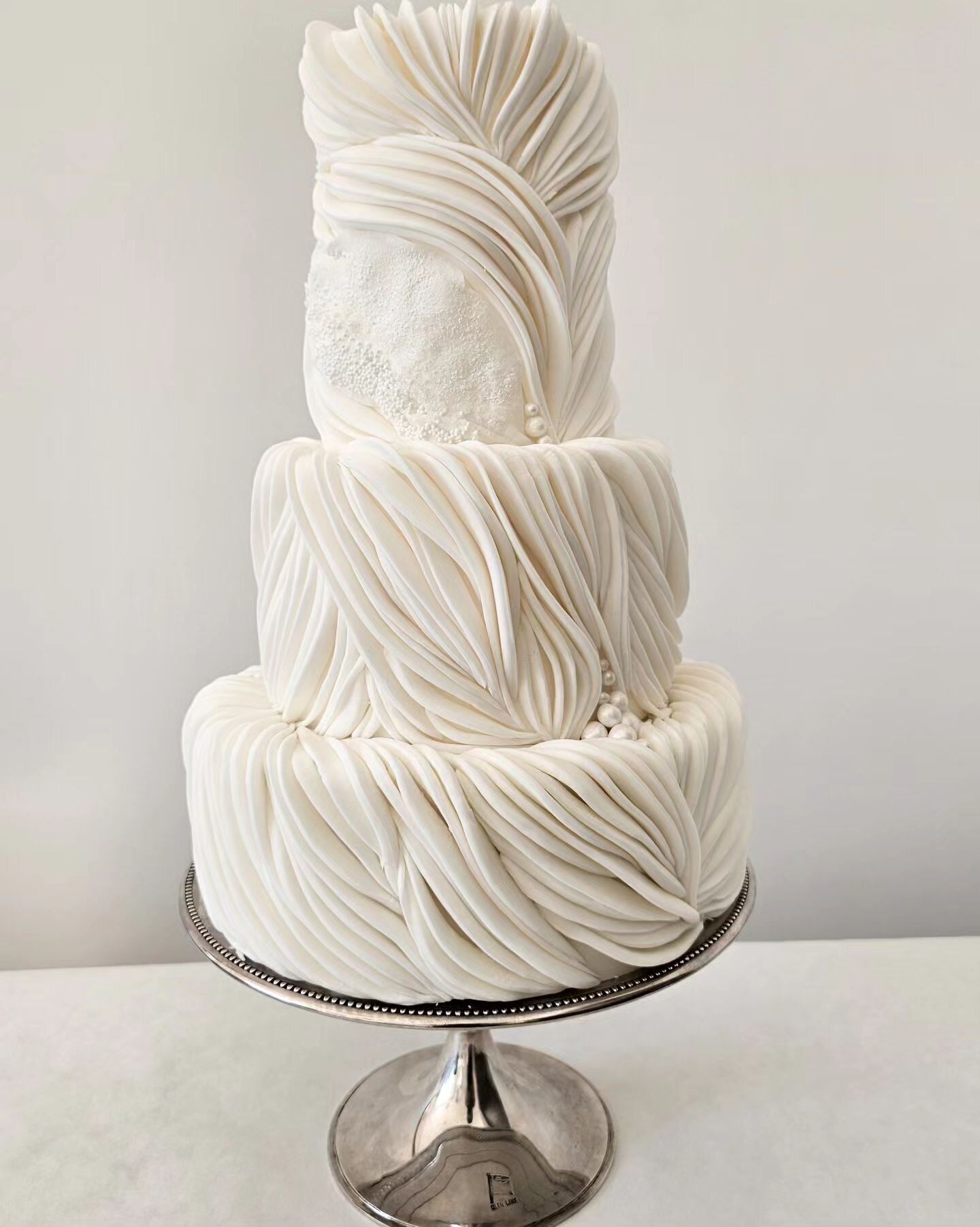 Lots &amp; lots of fondant waves with handmade pearls and textured rice paper.

#cake #cakeoftheday #igcakes #bridetobe #thelane #modernbride #modernwedding #destinationwedding #irishwedding #luxurywedding #love #couplegoals #isaidyes #thewed