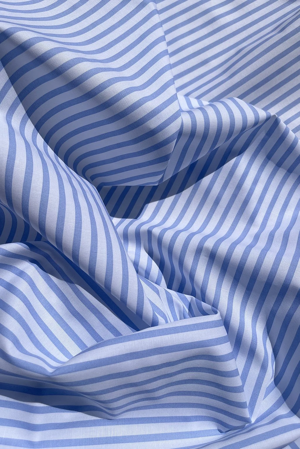 Italian cotton shirting stripe in sky blue and white.jpg