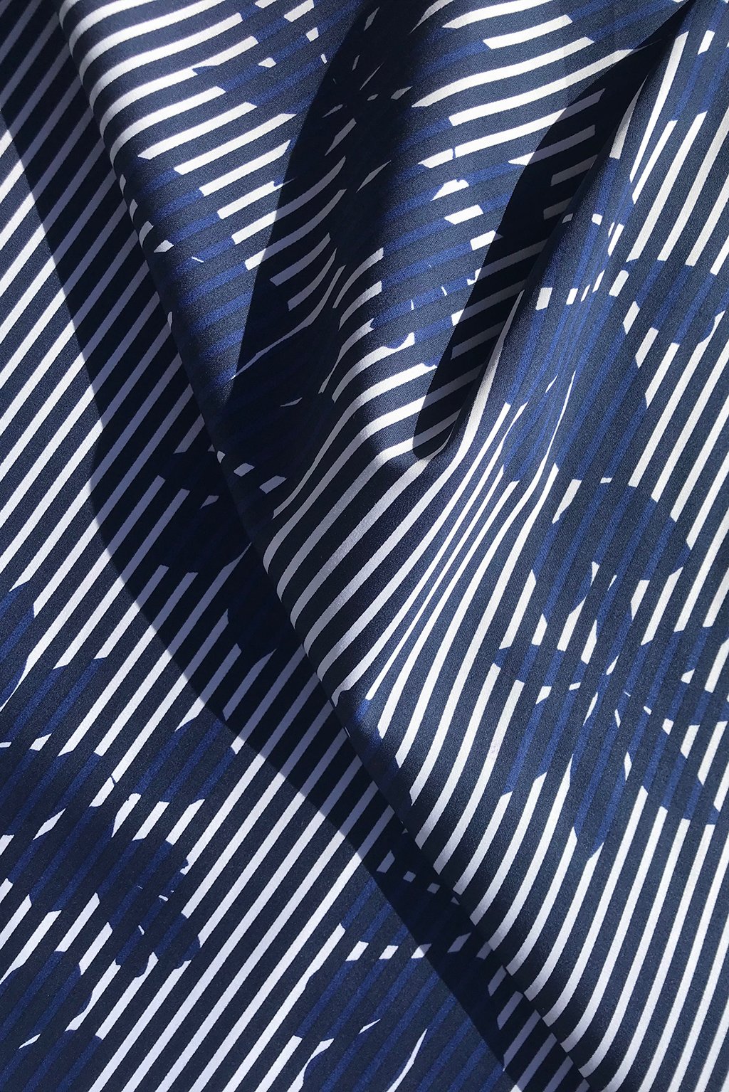 cotton in blue stripe with large scale leaf print5.jpg