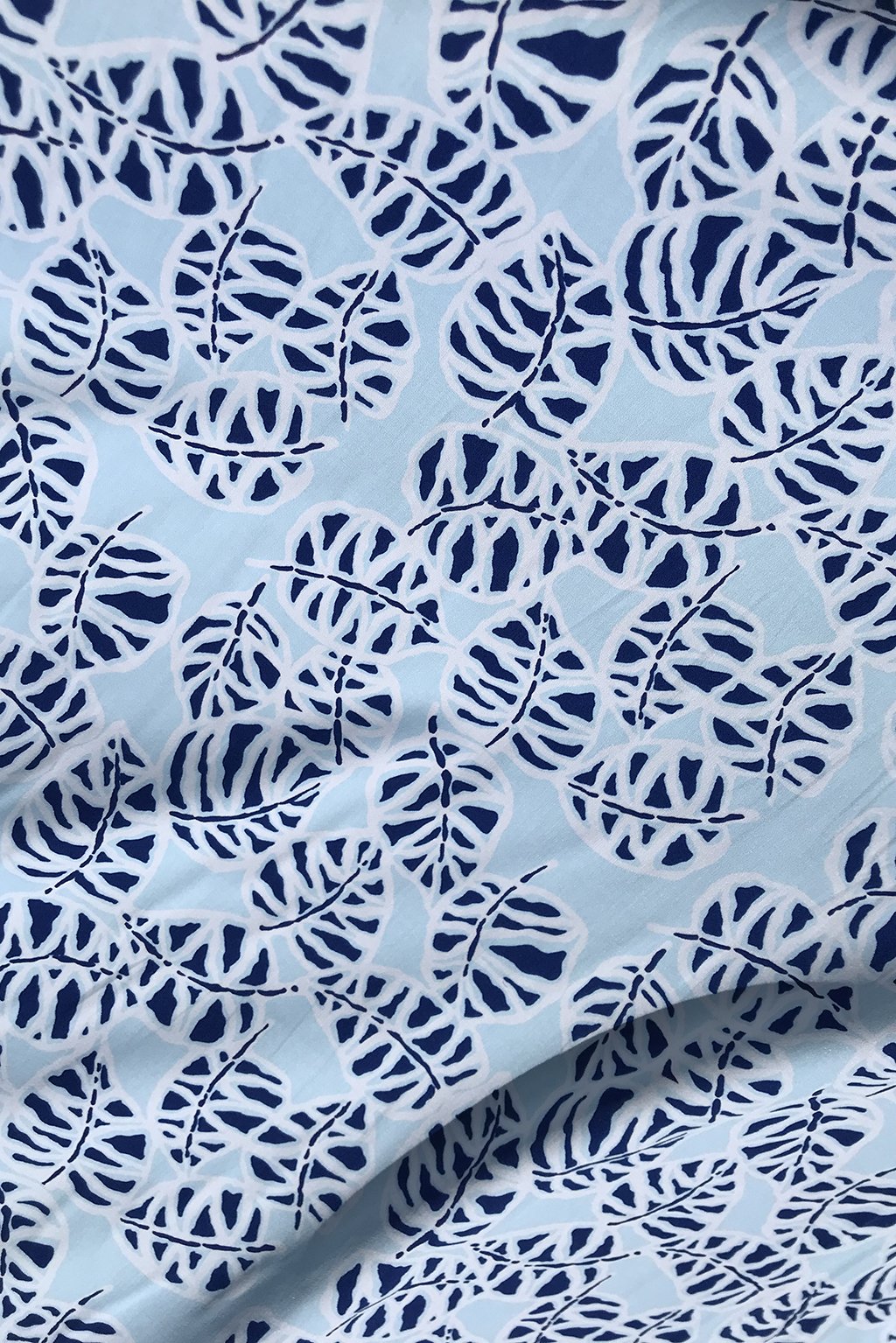 cotton in pale blue with monstera1.jpg