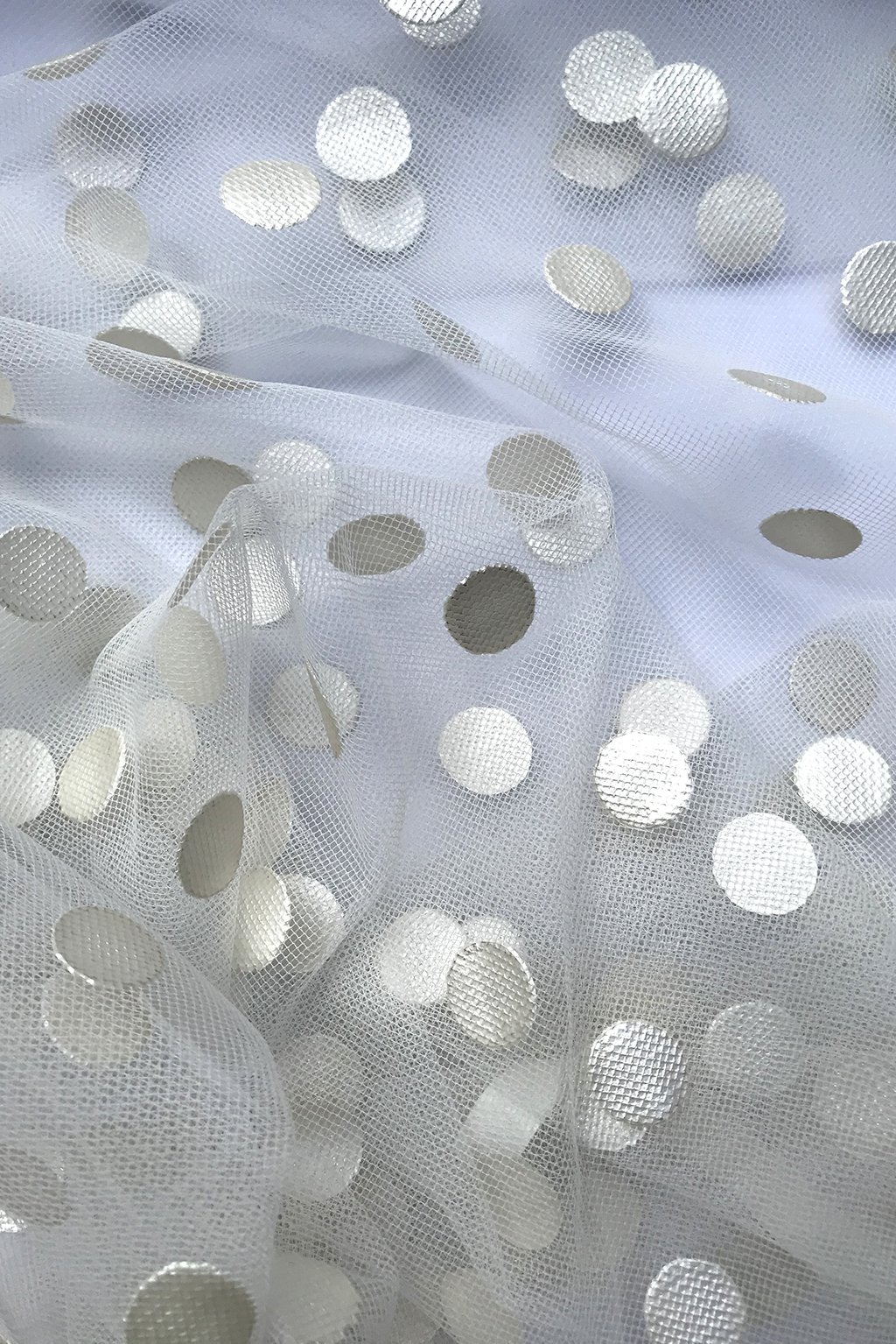 tulle in white with rubbery dots4.jpg