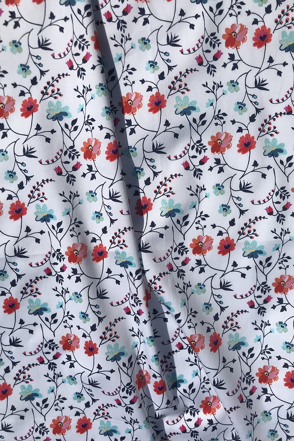 cotton in white with flowers in red and blue7.jpg
