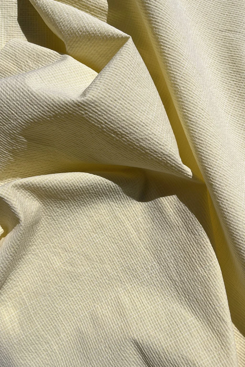 Cotton seersucker in daffodil yellow mini-check4.jpg