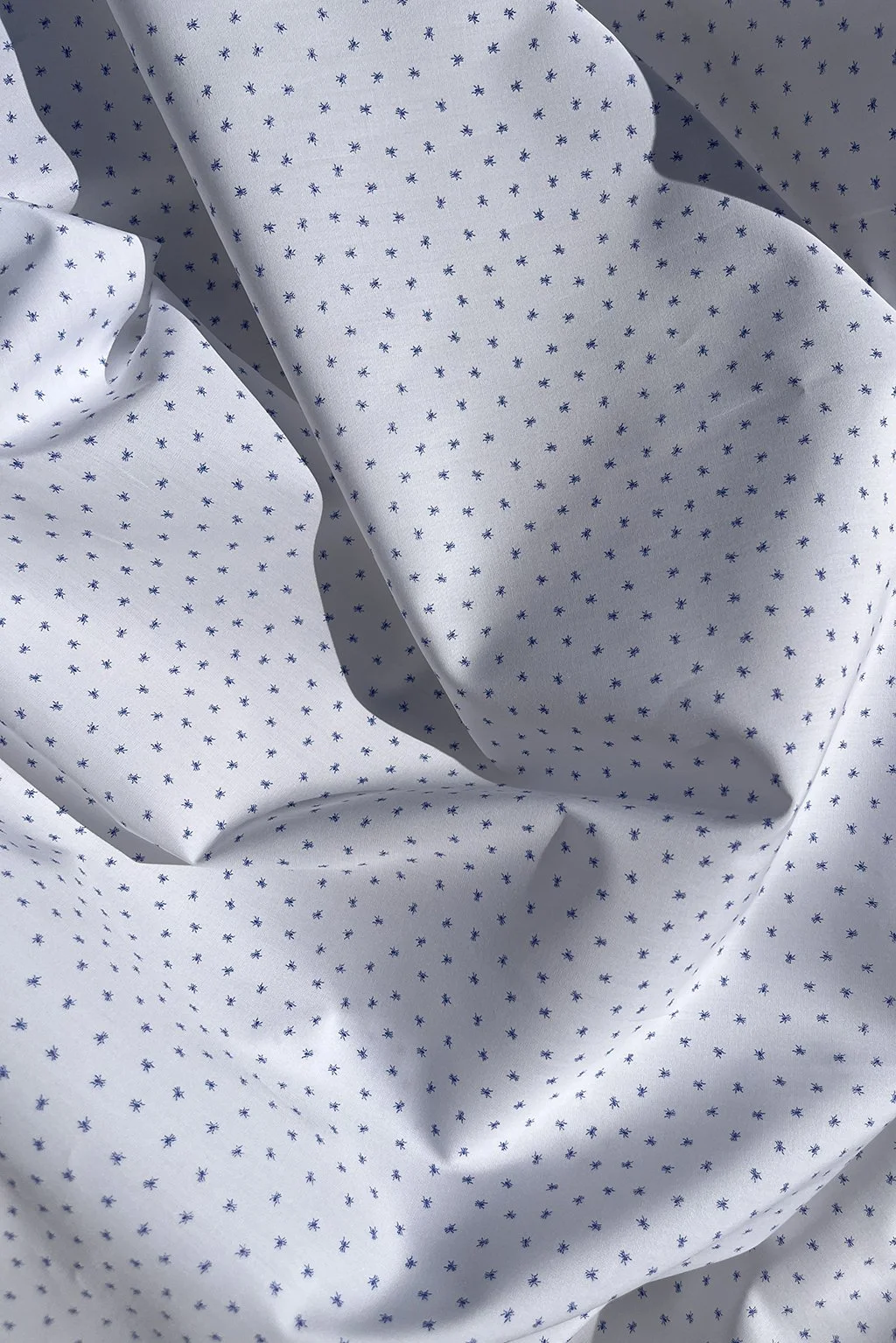 Italian cotton in white with tiny spiders.jpg