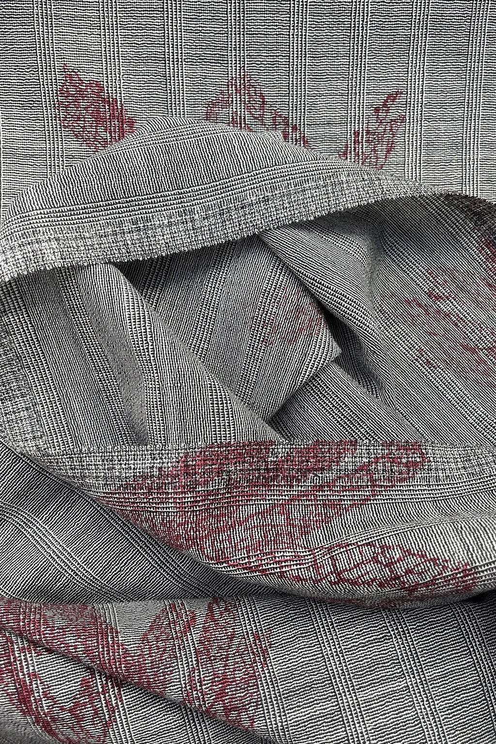 Italian fine wool in micro stripe with an abstract overprint in burgundy.jpg