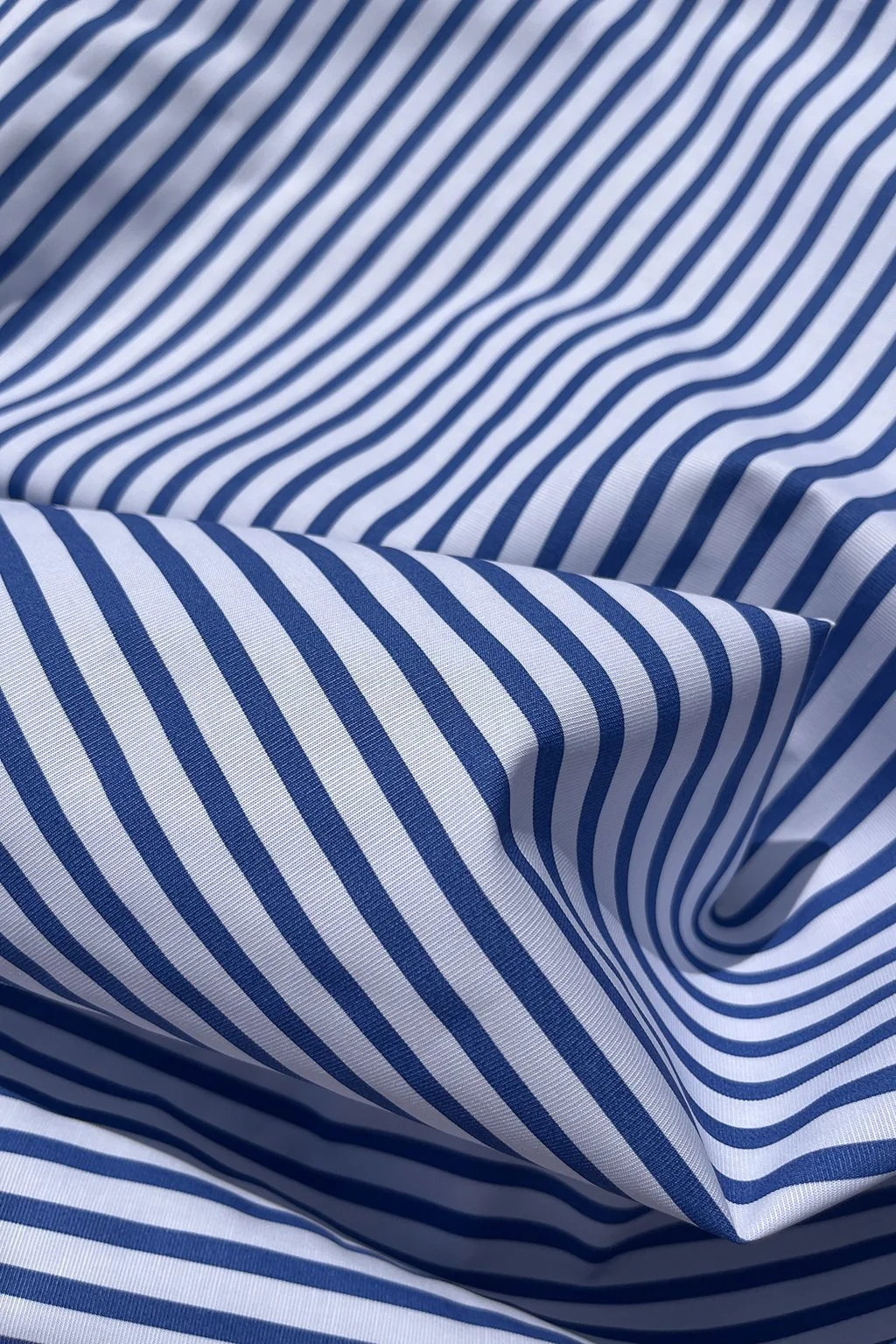 Cotton shirting in white and ocean blue stripe aa.jpg