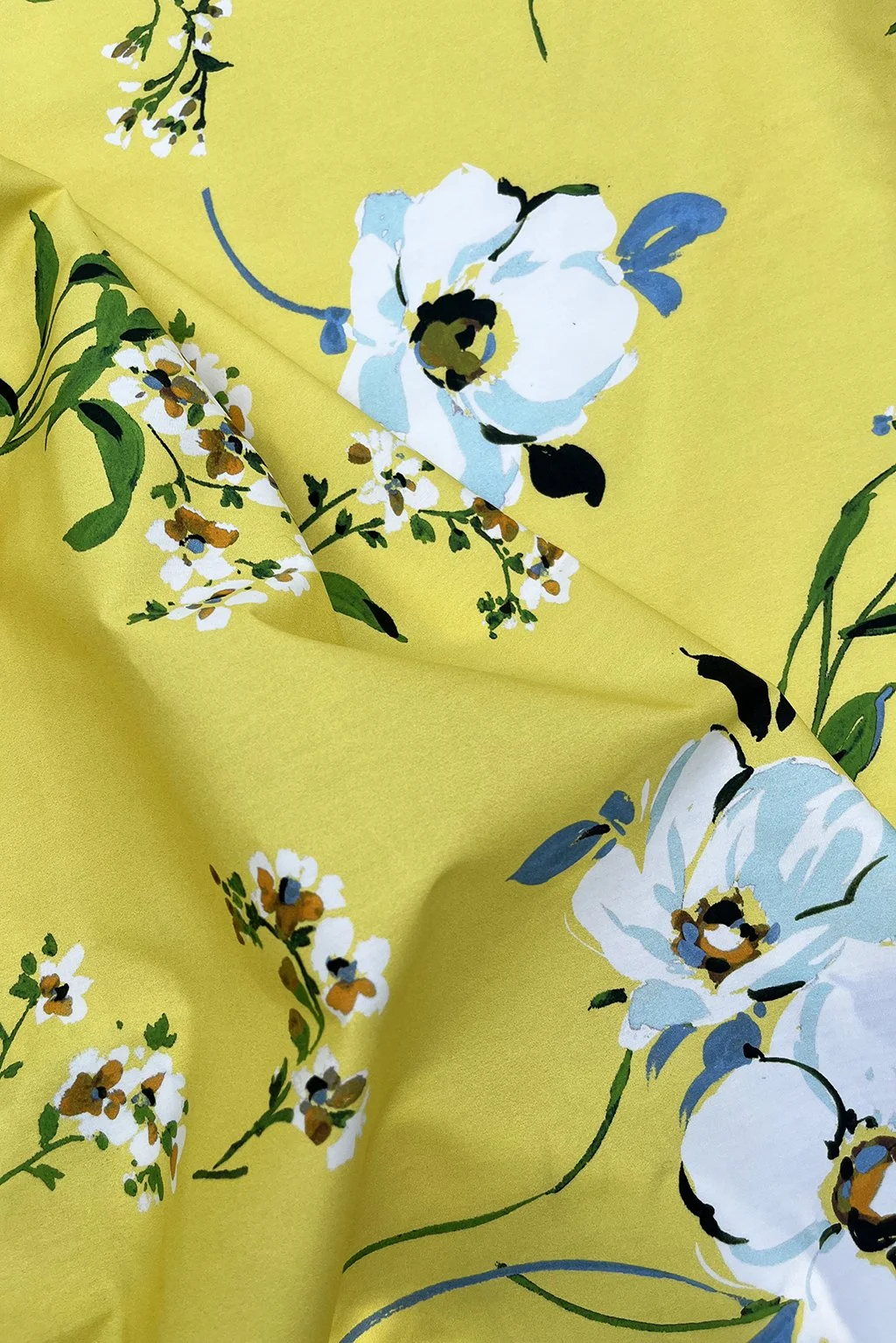 cotton in yellow with large scale flowers.jpg