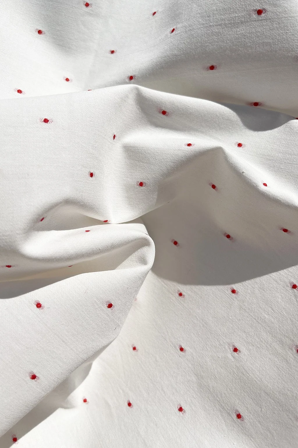 french cotton with woven red dot1.jpg
